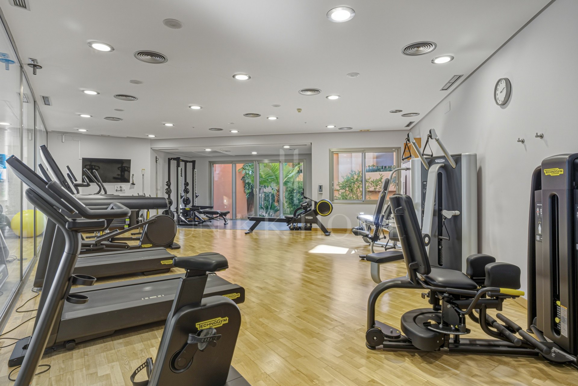 Beautiful, two bedroom, south facing ground floor apartment in the prestigious Mansion Club Marbella