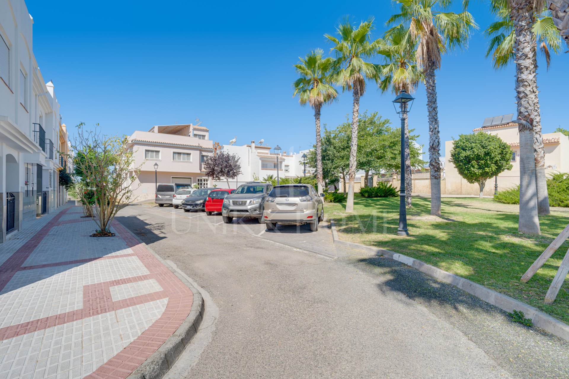 Unique five bedroom townhouse with rooftop terrace & excellent rental potential in Cancelada, Estepona