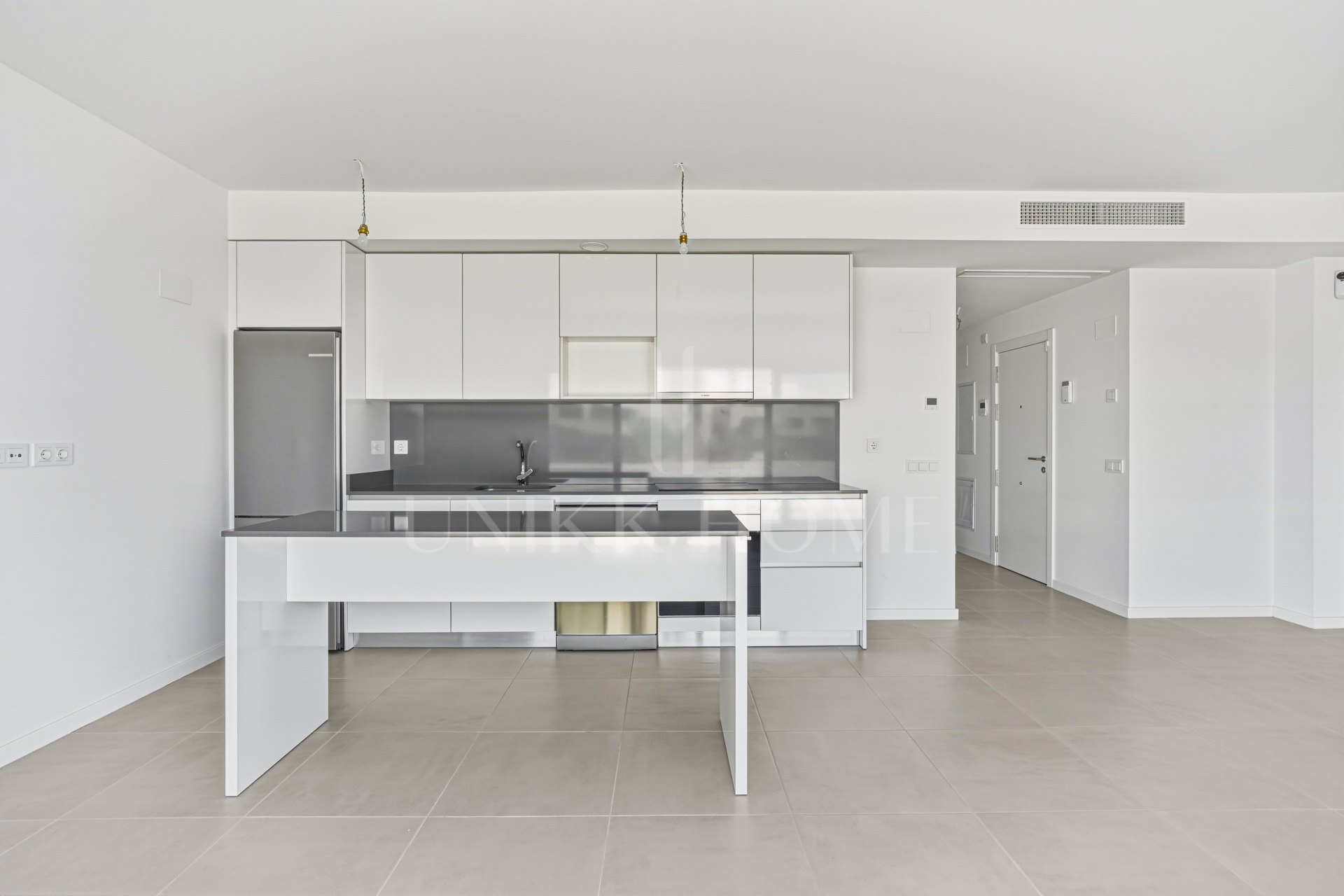 Brand new southwest facing two bedroom apartment located in the sought-after gated community Acqua Gardens, Estepona