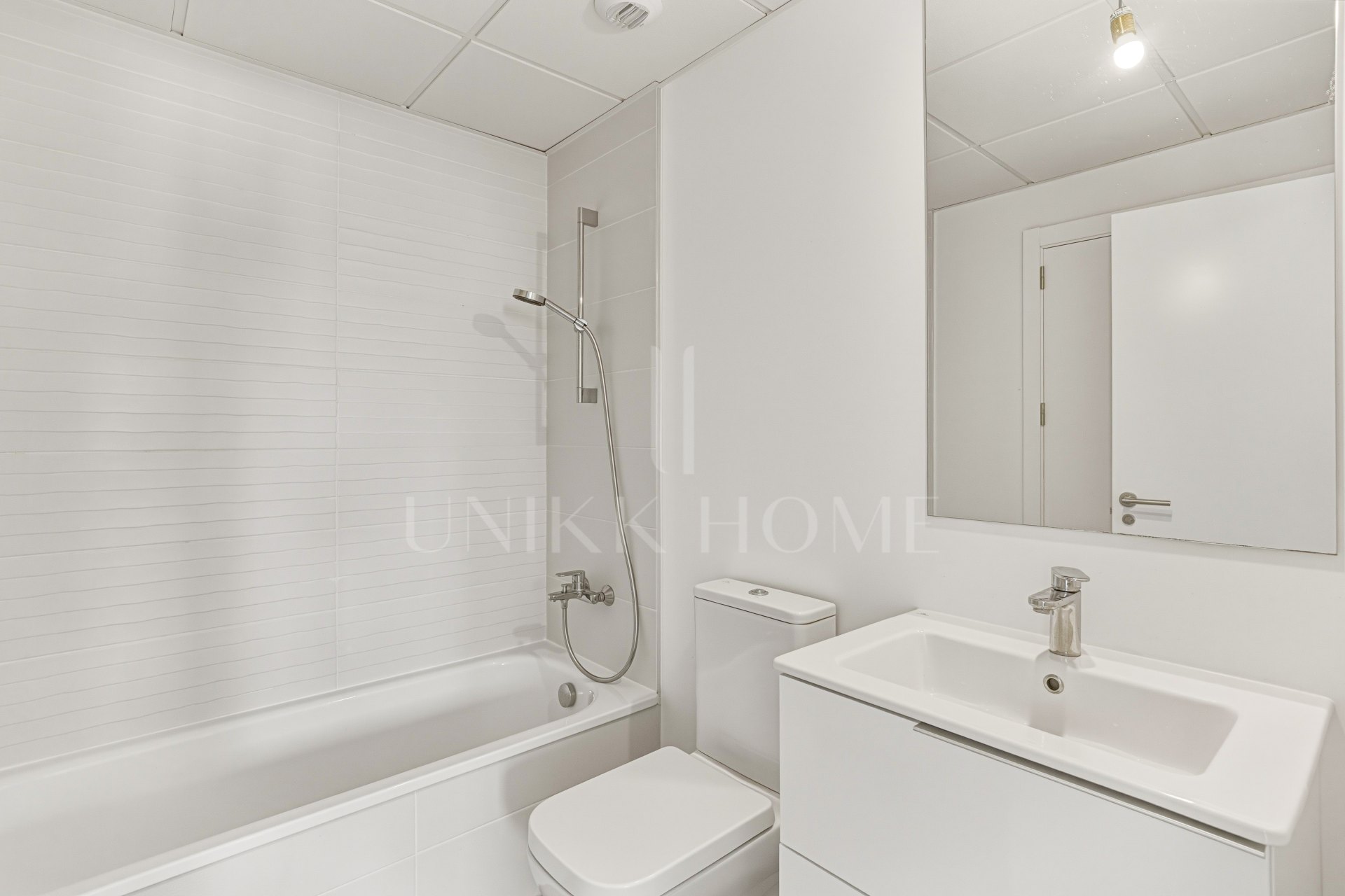 Brand new southwest facing two bedroom apartment located in the sought-after gated community Acqua Gardens, Estepona