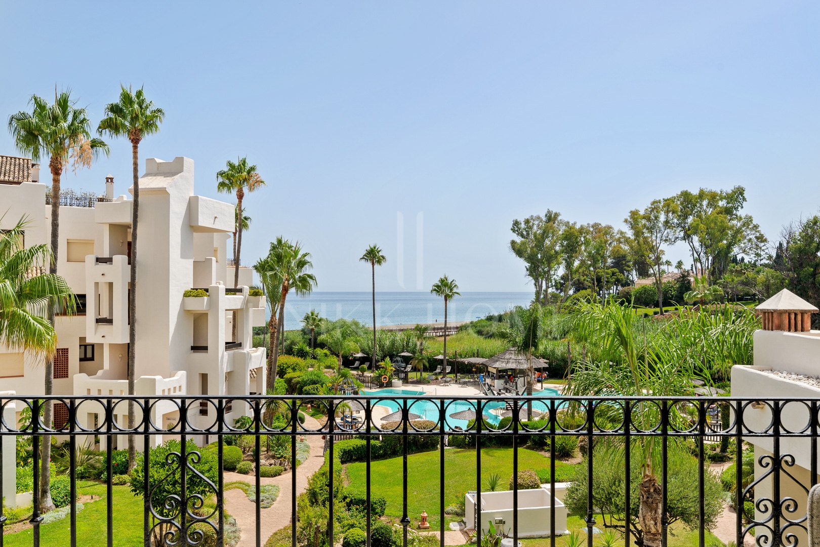 Beautifully renovated, south facing three-bedroom apartment located in the prestigious gated community of Bahia del Velerin, Estepona