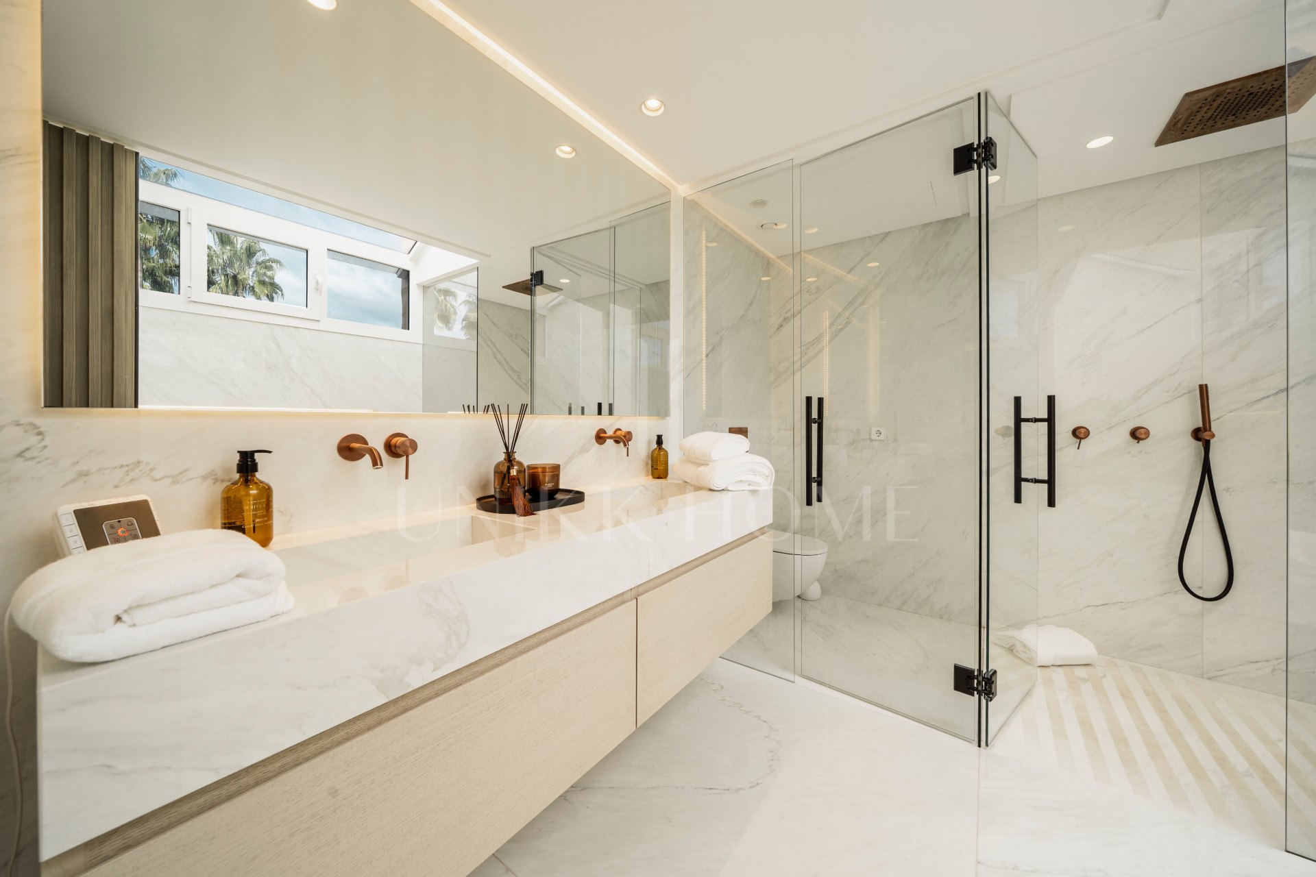 Modern Coastal-Inspired Duplex Penthouse in Gated Community