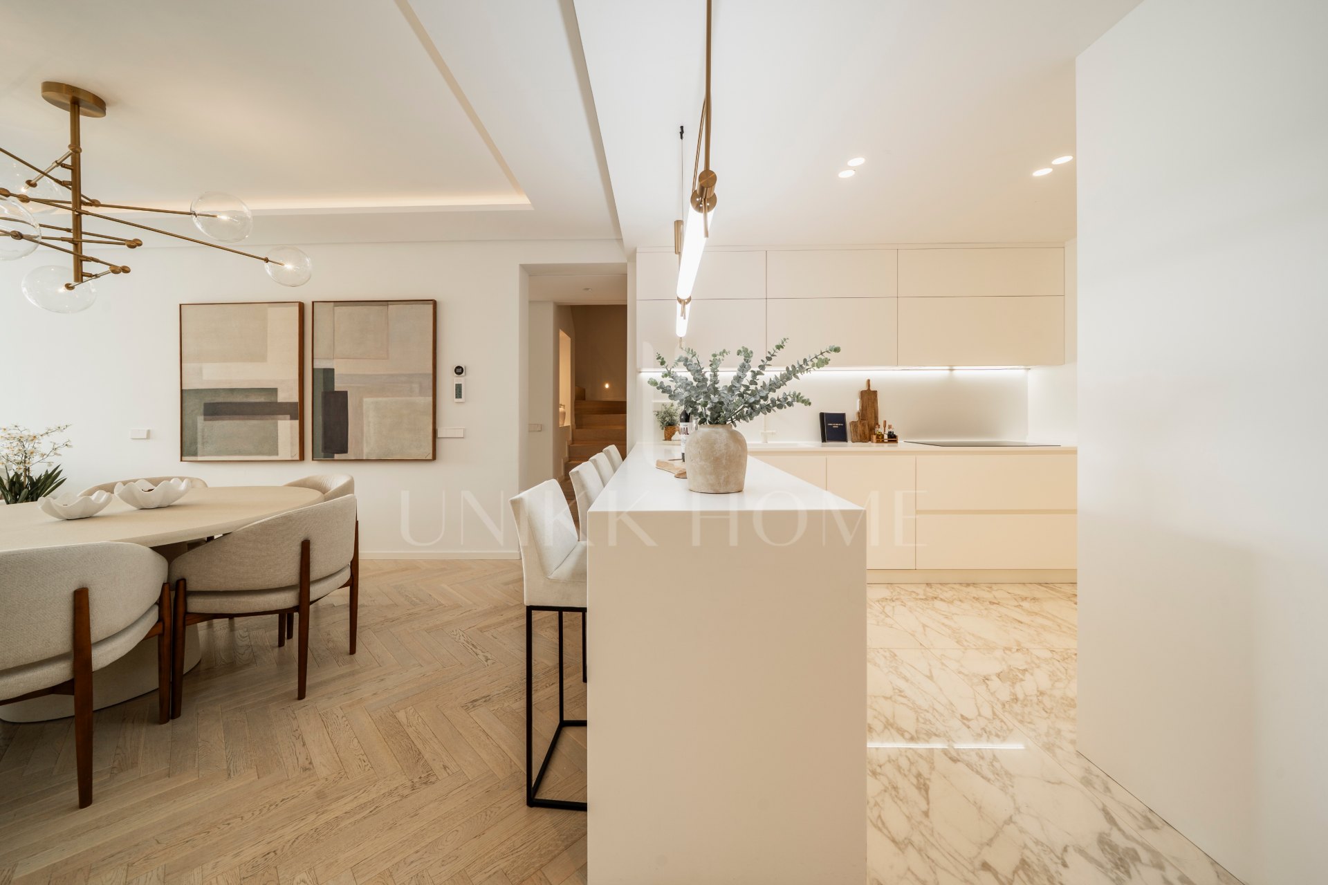 Modern Coastal-Inspired Duplex Penthouse in Gated Community