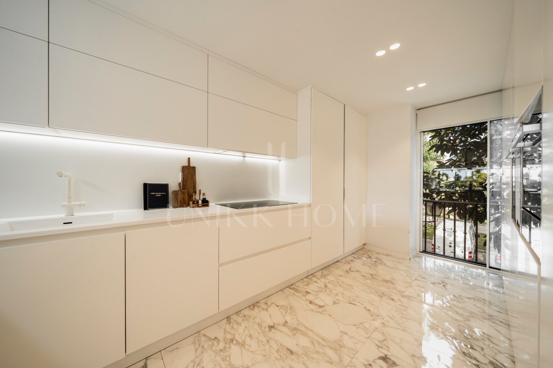 Modern Coastal-Inspired Duplex Penthouse in Gated Community