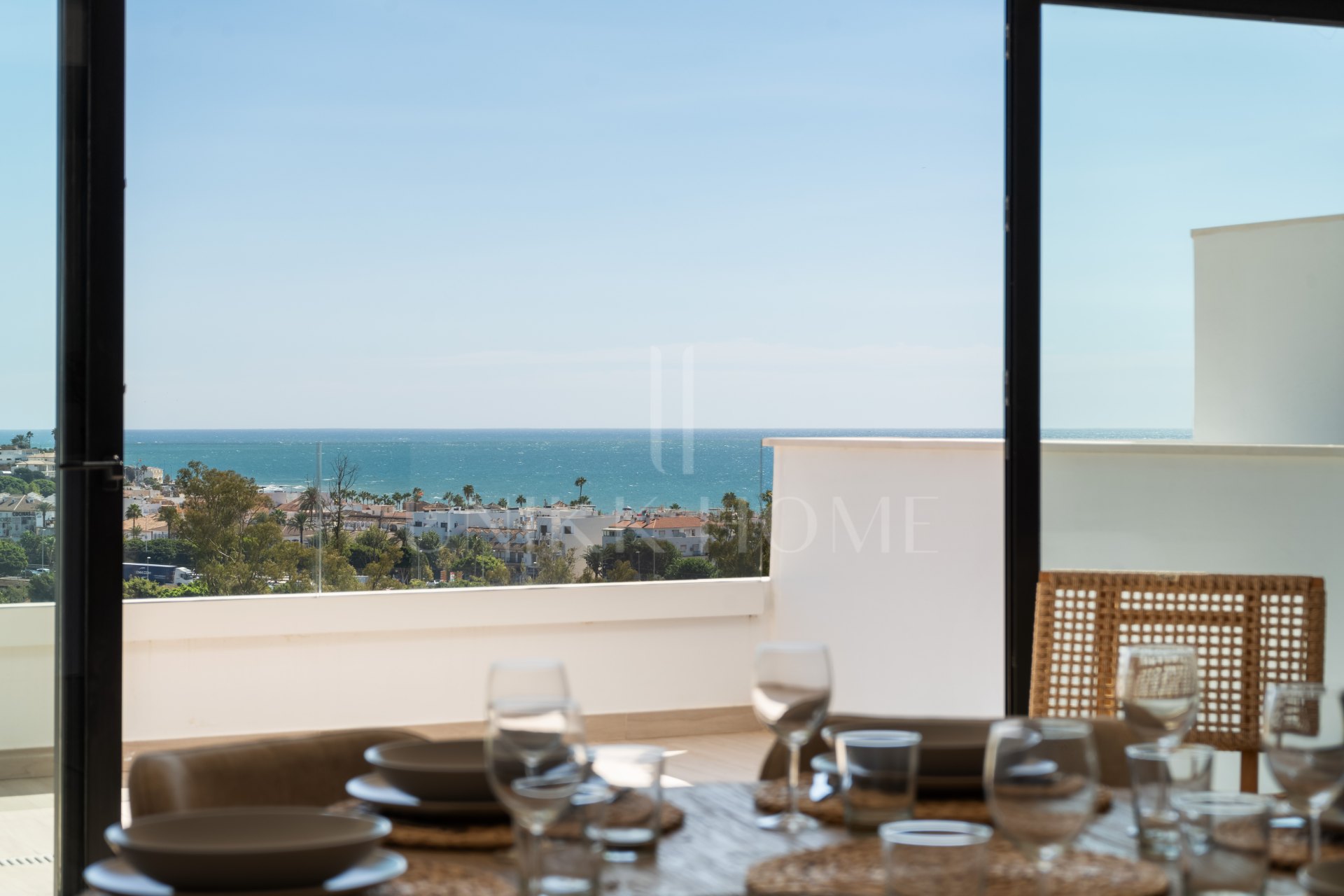 ELEGANT 4-BEDROOM HOME WITH EXPANSIVE TERRACE AND OPEN VIEWS IN LA CALA DE MIJAS