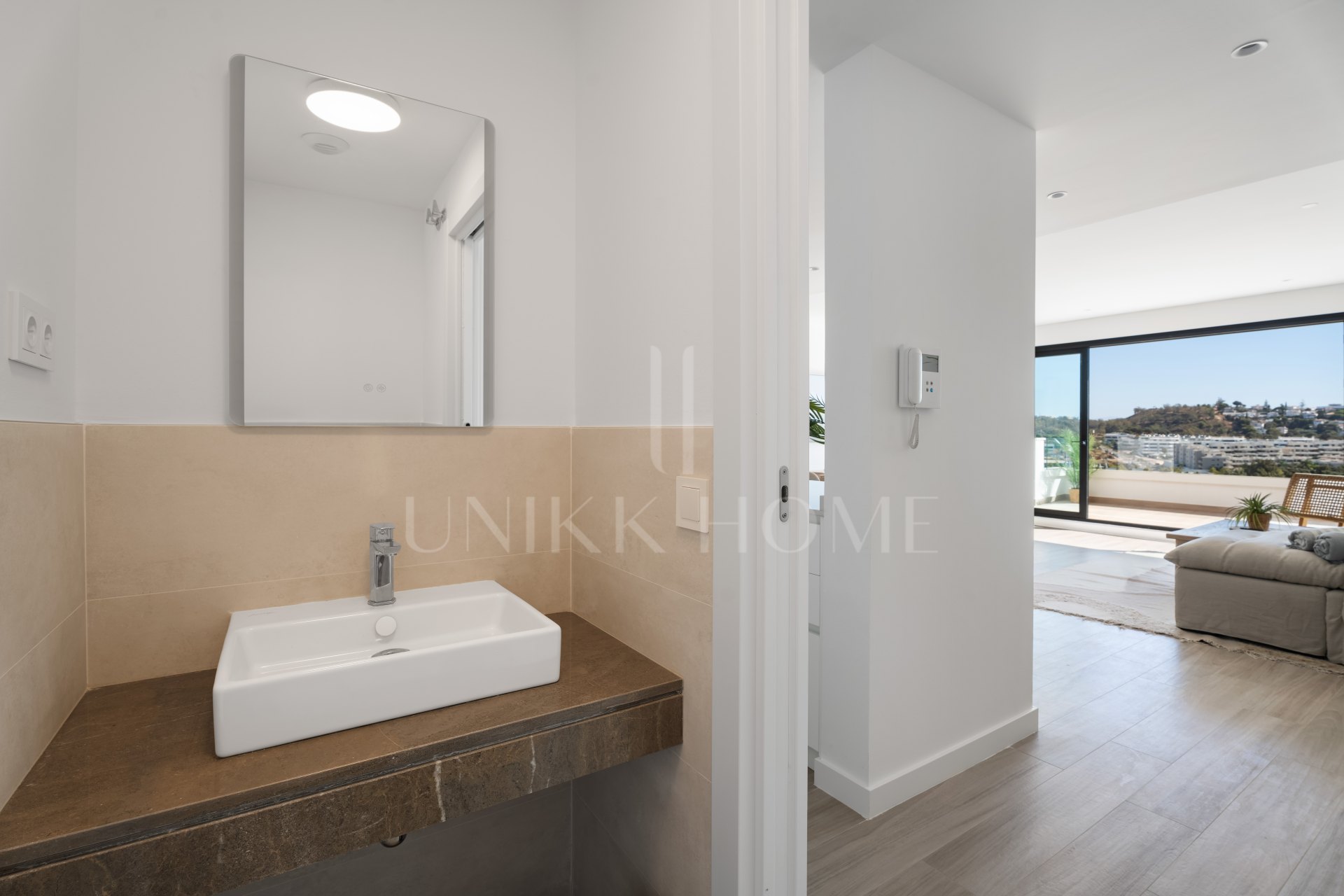 ELEGANT 4-BEDROOM HOME WITH EXPANSIVE TERRACE AND OPEN VIEWS IN LA CALA DE MIJAS