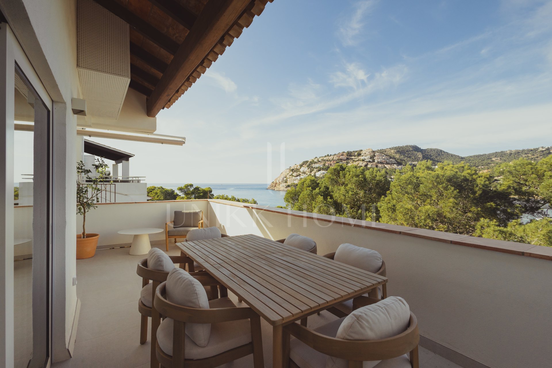 Apartamento completamente renovado con vistas panorámicas al mar y al puerto en Port d’Andratx