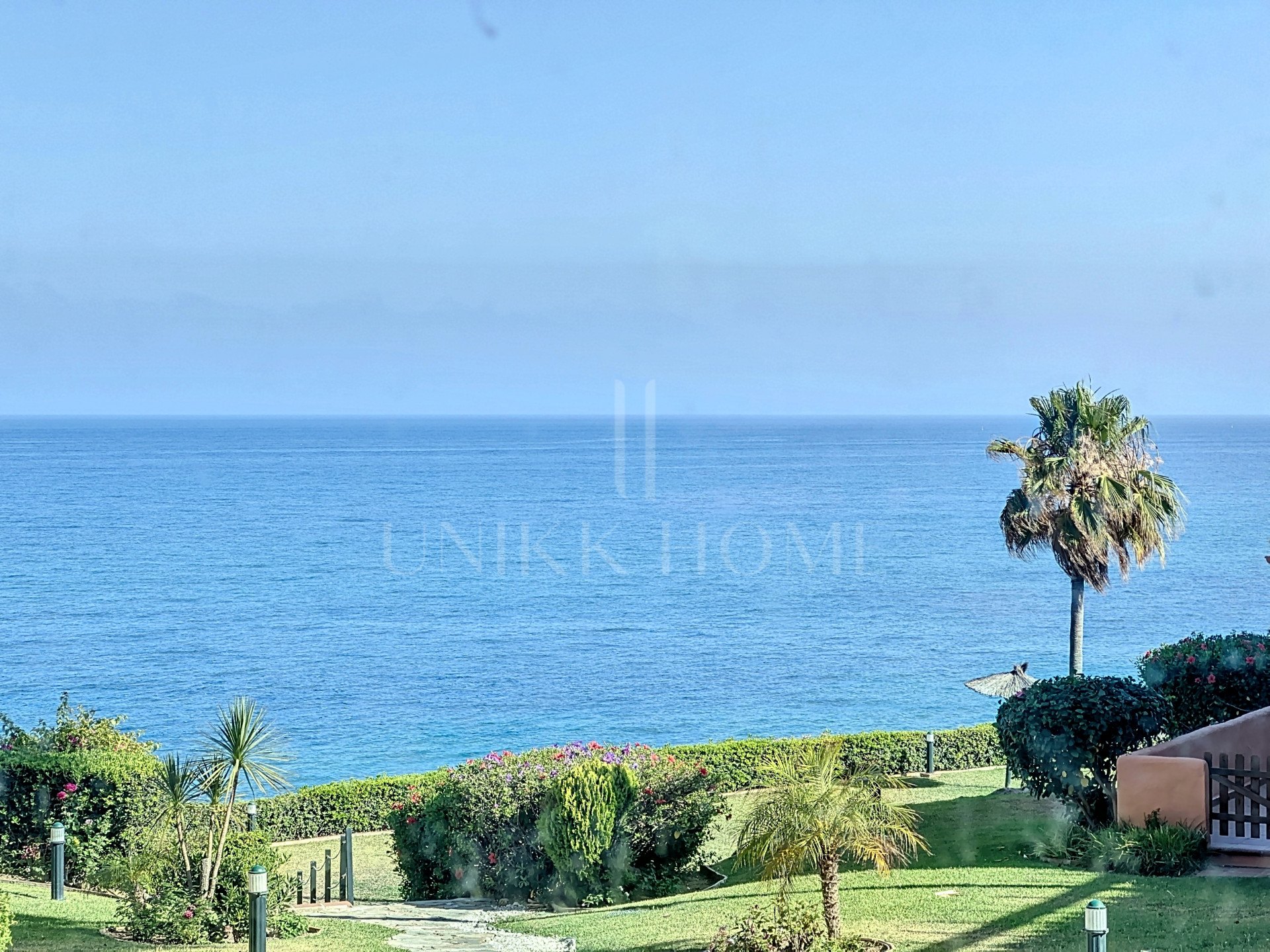 Exceptional Beachfront Townhouse with Panoramic Sea Views in Estepona West
