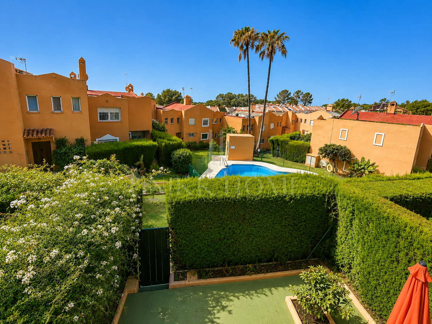 Townhouse in Diana Park, with private patio, in a gated community with communal pool near the beach and amenities