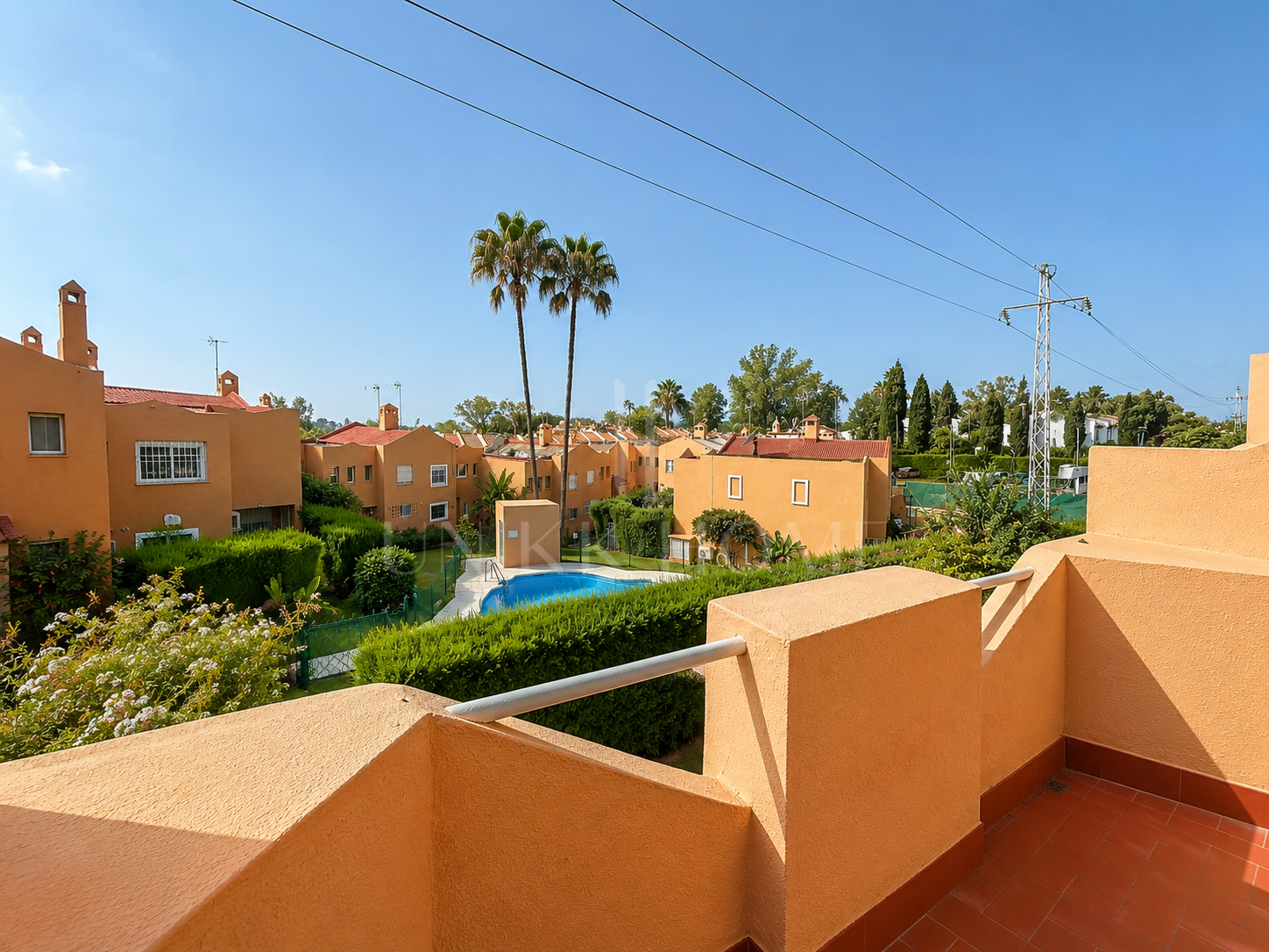 Townhouse in Diana Park, with private patio, in a gated community with communal pool near the beach and amenities