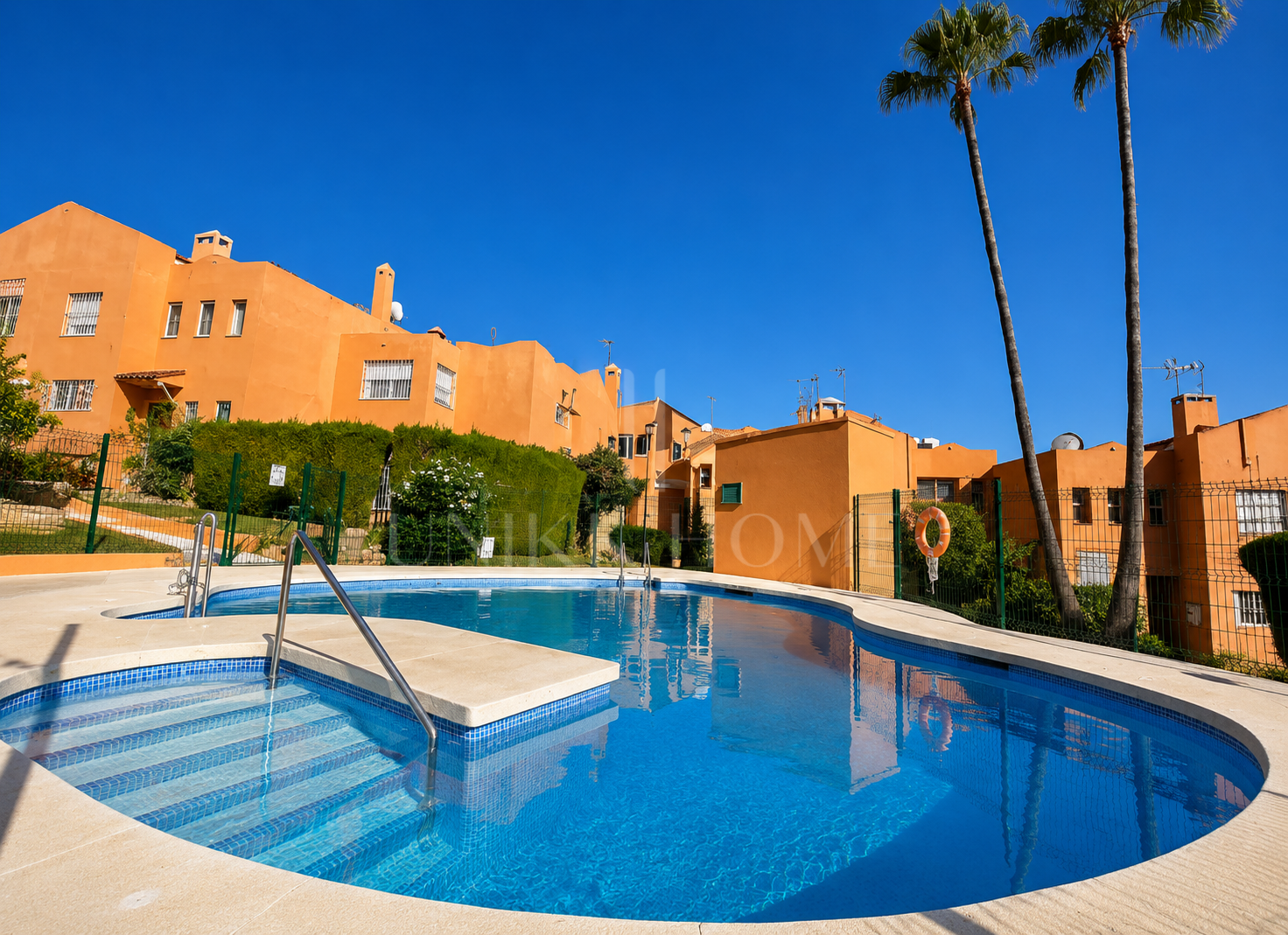 Townhouse in Diana Park, with private patio, in a gated community with communal pool near the beach and amenities