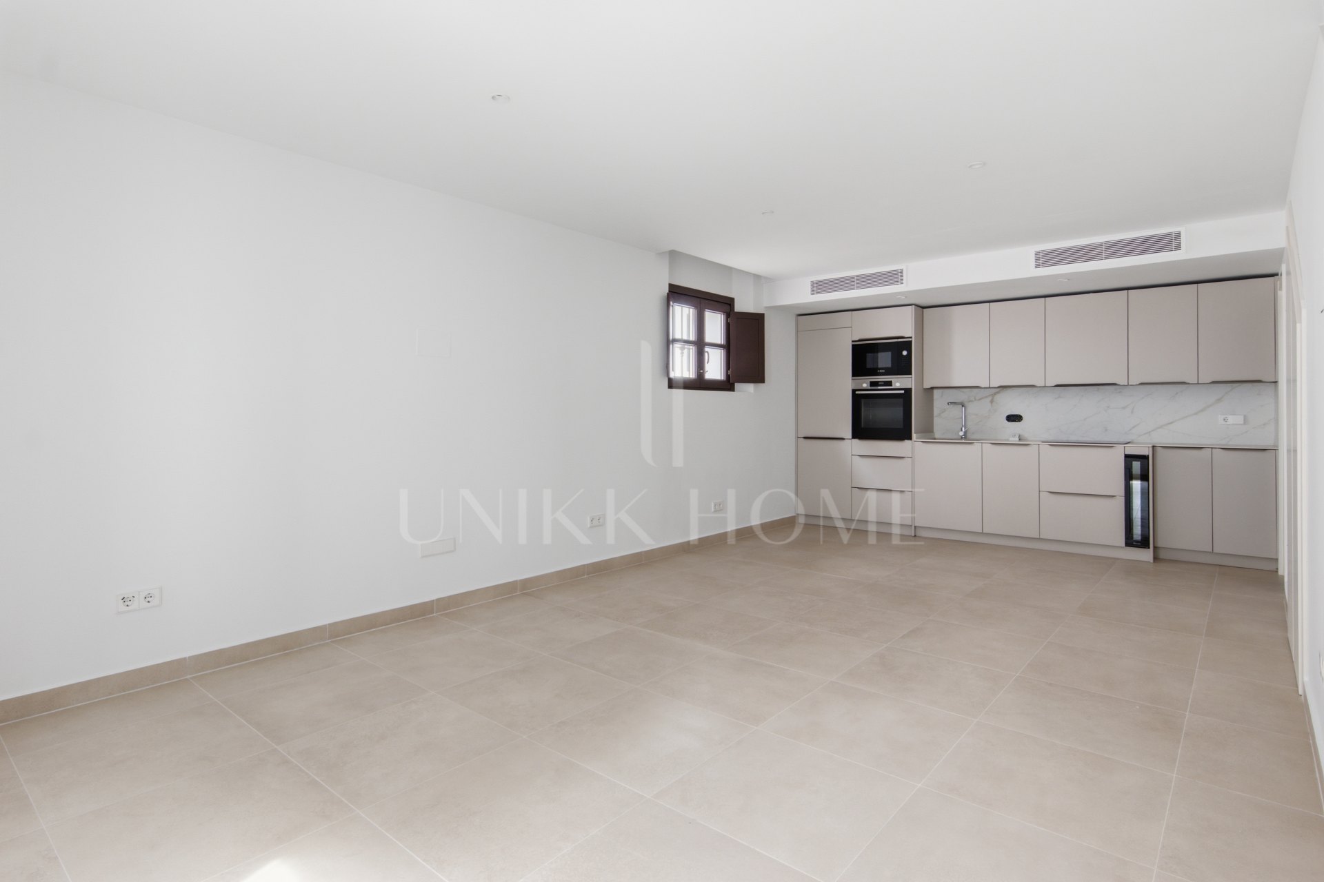 Brand-New Townhouse with Private Rooftop Terrace, Steps from the Beach in Estepona Old Town