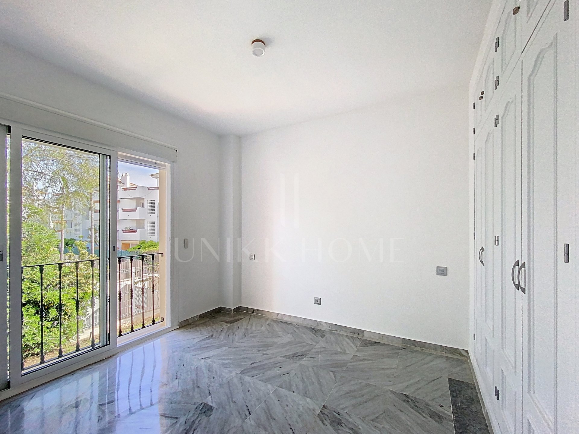 Elevated Ground Floor Sea View Apartment for Sale in Estepona East – Large Terraces & Jacuzzi