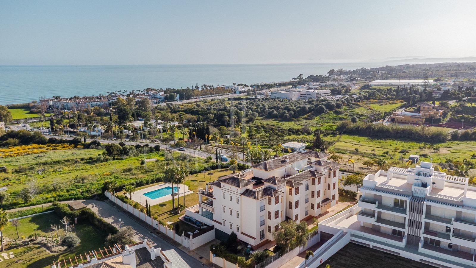 Elevated Ground Floor Sea View Apartment for Sale in Estepona East – Large Terraces & Jacuzzi
