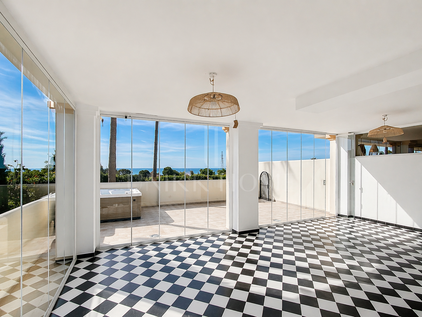 Elevated Ground Floor Sea View Apartment for Sale in Estepona East – Large Terraces & Jacuzzi