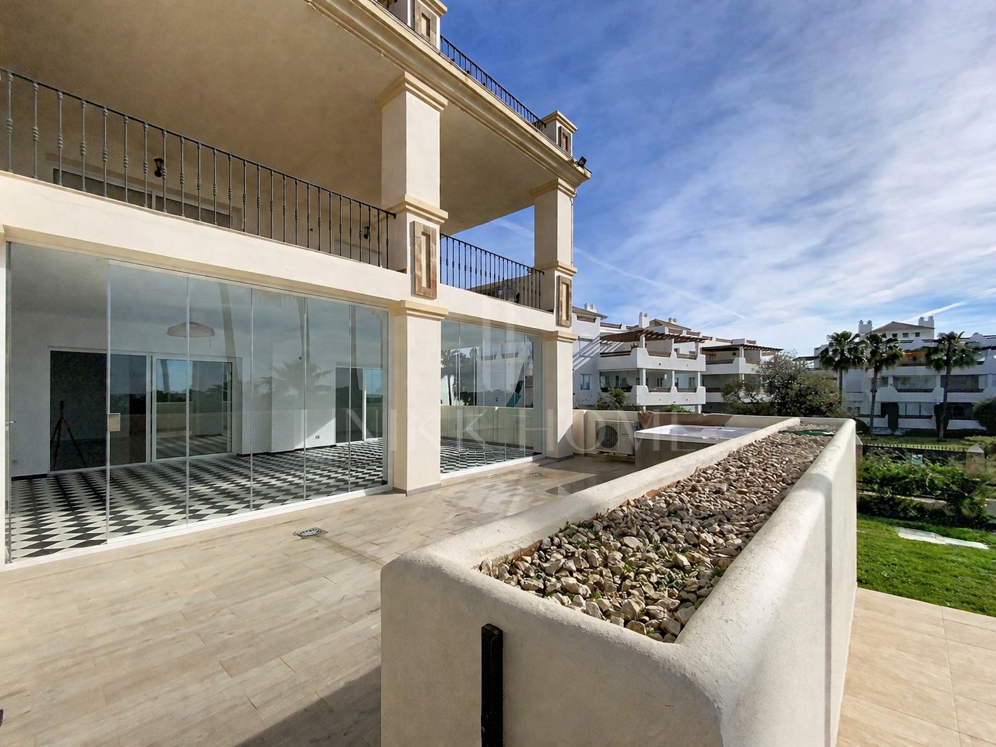 Elevated Ground Floor Sea View Apartment for Sale in Estepona East – Large Terraces & Jacuzzi