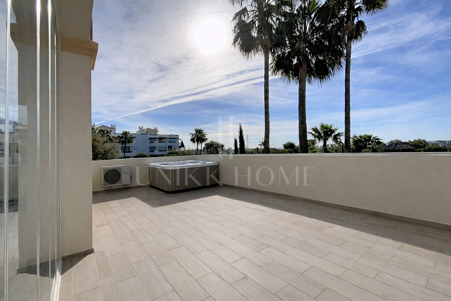 Elevated Ground Floor Sea View Apartment for Sale in Estepona East – Large Terraces & Jacuzzi