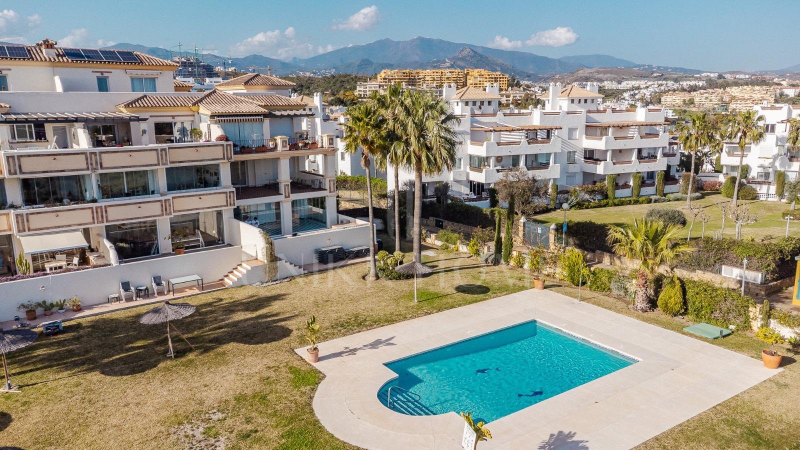 Elevated Ground Floor Sea View Apartment for Sale in Estepona East – Large Terraces & Jacuzzi