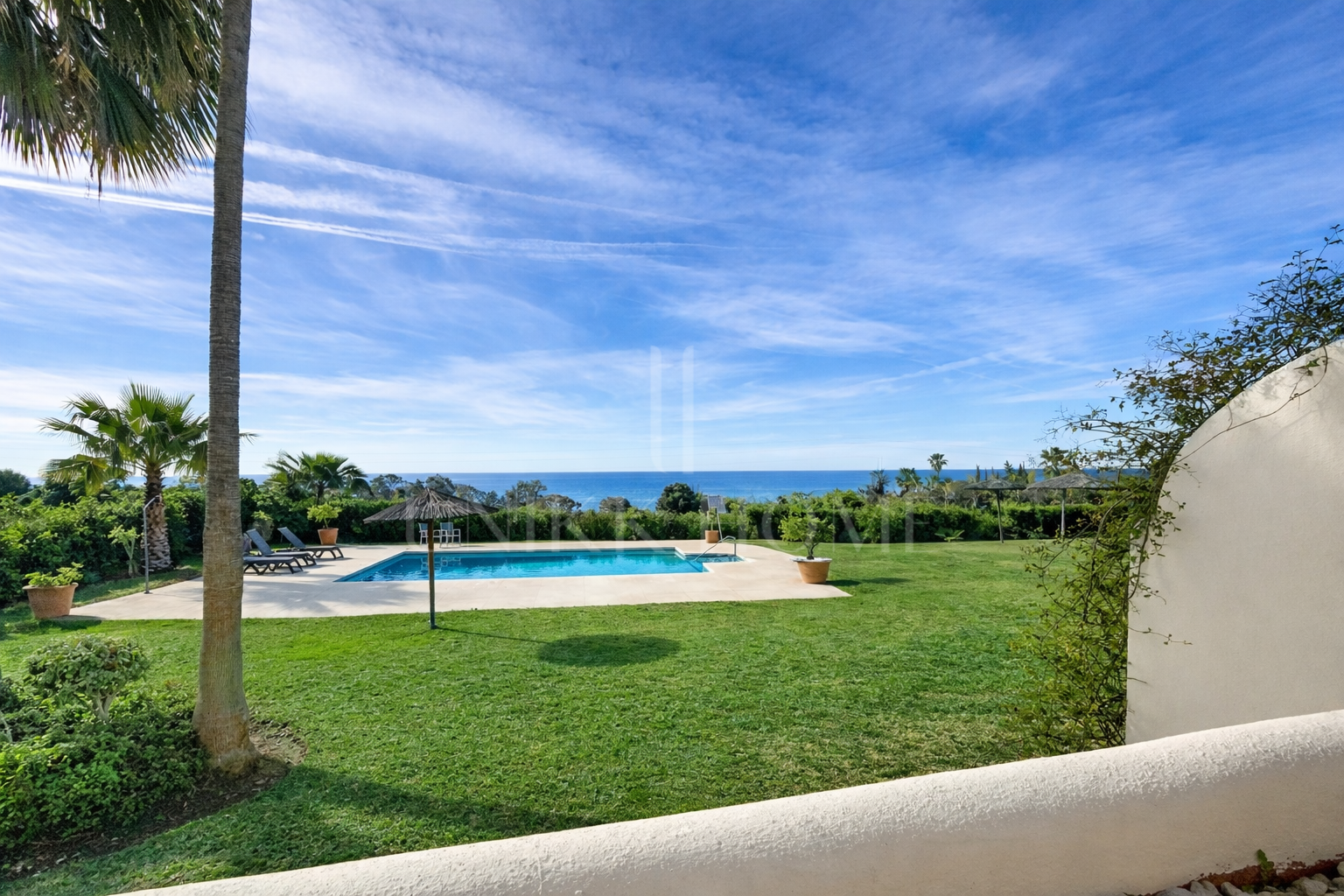 Elevated Ground Floor Sea View Apartment for Sale in Estepona East – Large Terraces & Jacuzzi