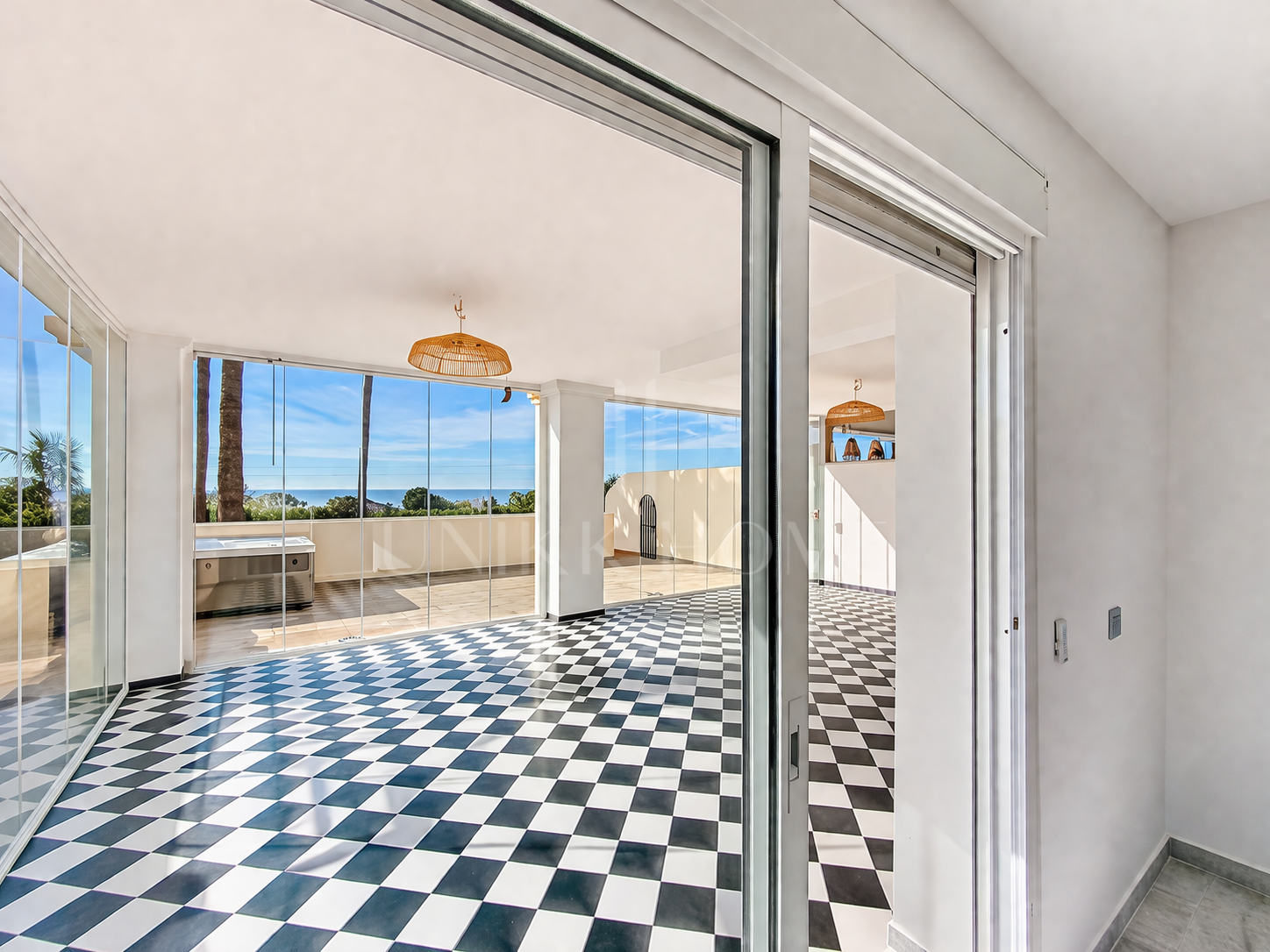 Elevated Ground Floor Sea View Apartment for Sale in Estepona East – Large Terraces & Jacuzzi
