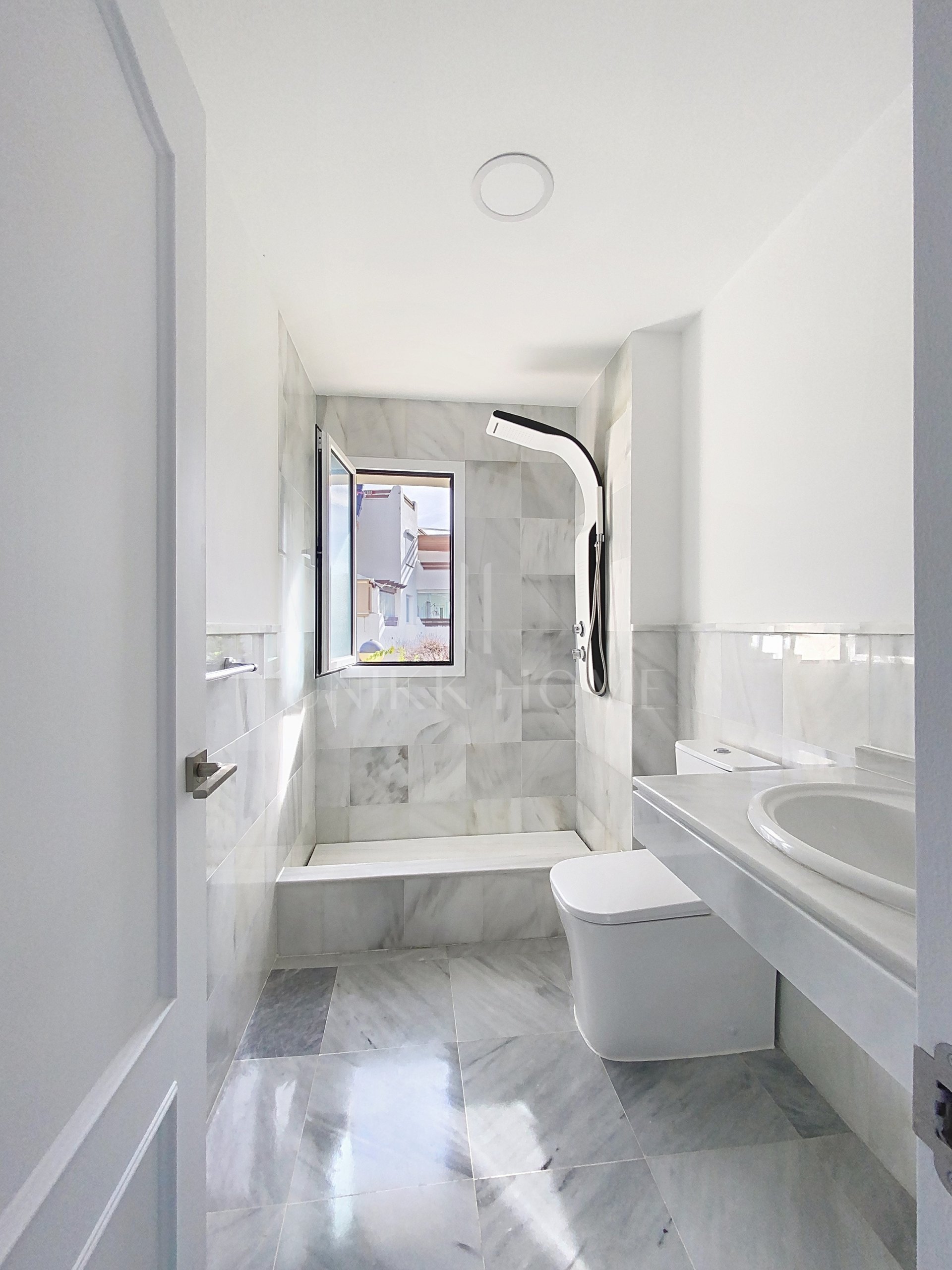 Elevated Ground Floor Sea View Apartment for Sale in Estepona East – Large Terraces & Jacuzzi
