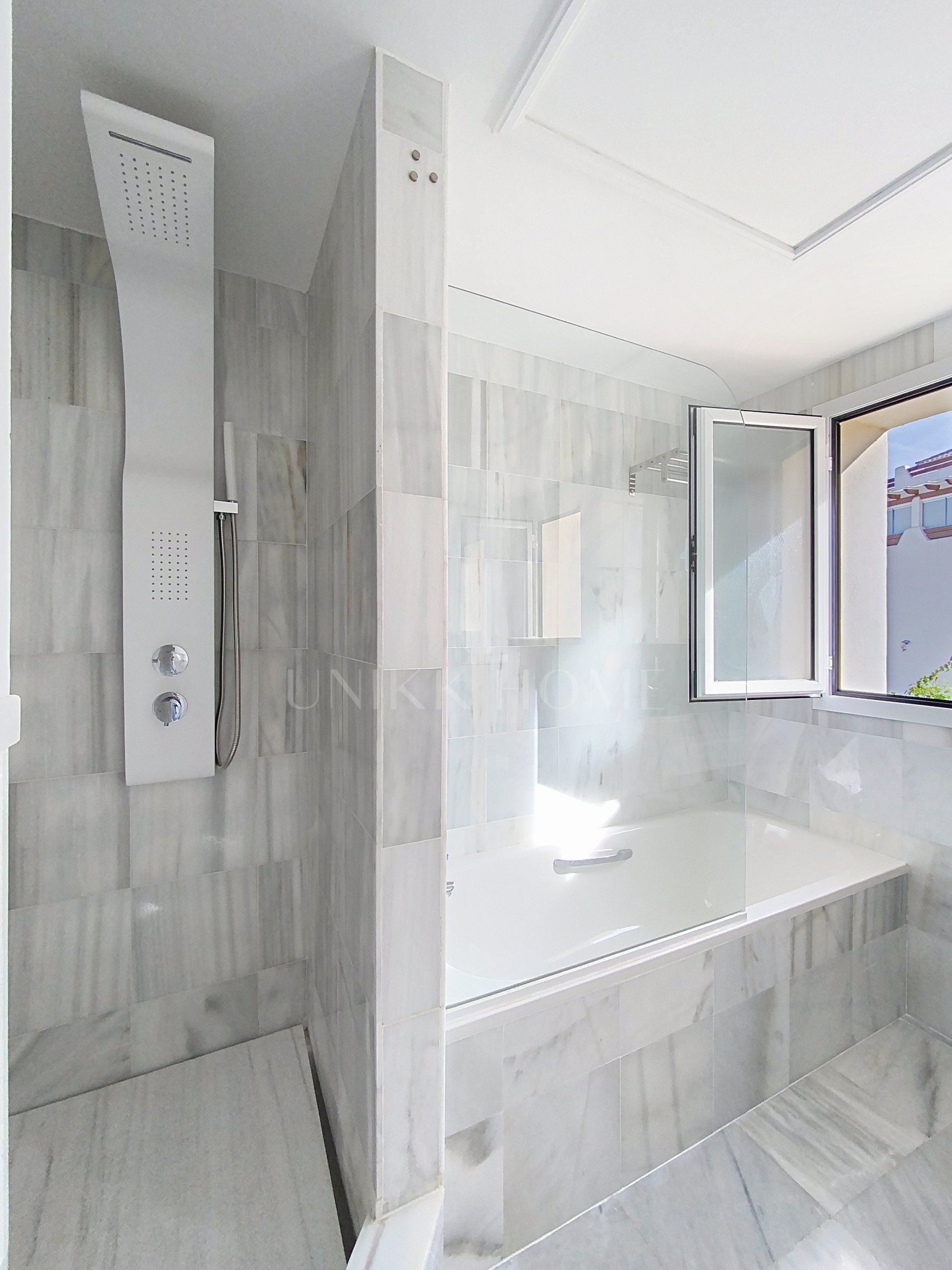 Elevated Ground Floor Sea View Apartment for Sale in Estepona East – Large Terraces & Jacuzzi