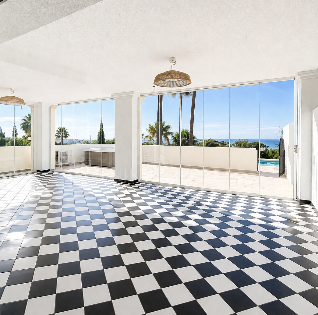 Elevated Ground Floor Sea View Apartment for Sale in Estepona East – Large Terraces & Jacuzzi