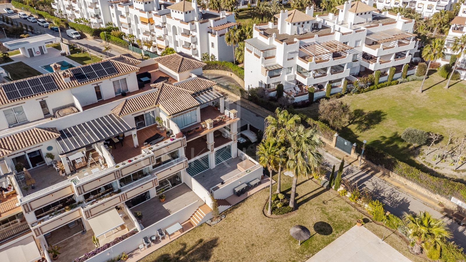 Elevated Ground Floor Sea View Apartment for Sale in Estepona East – Large Terraces & Jacuzzi