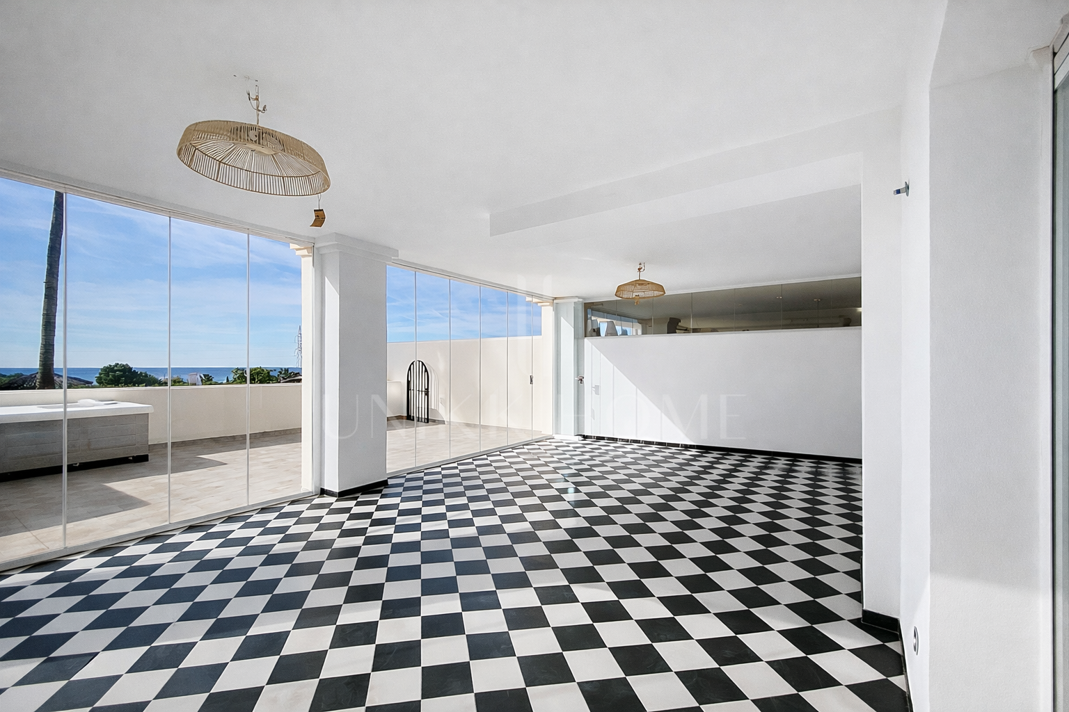 Elevated Ground Floor Sea View Apartment for Sale in Estepona East – Large Terraces & Jacuzzi