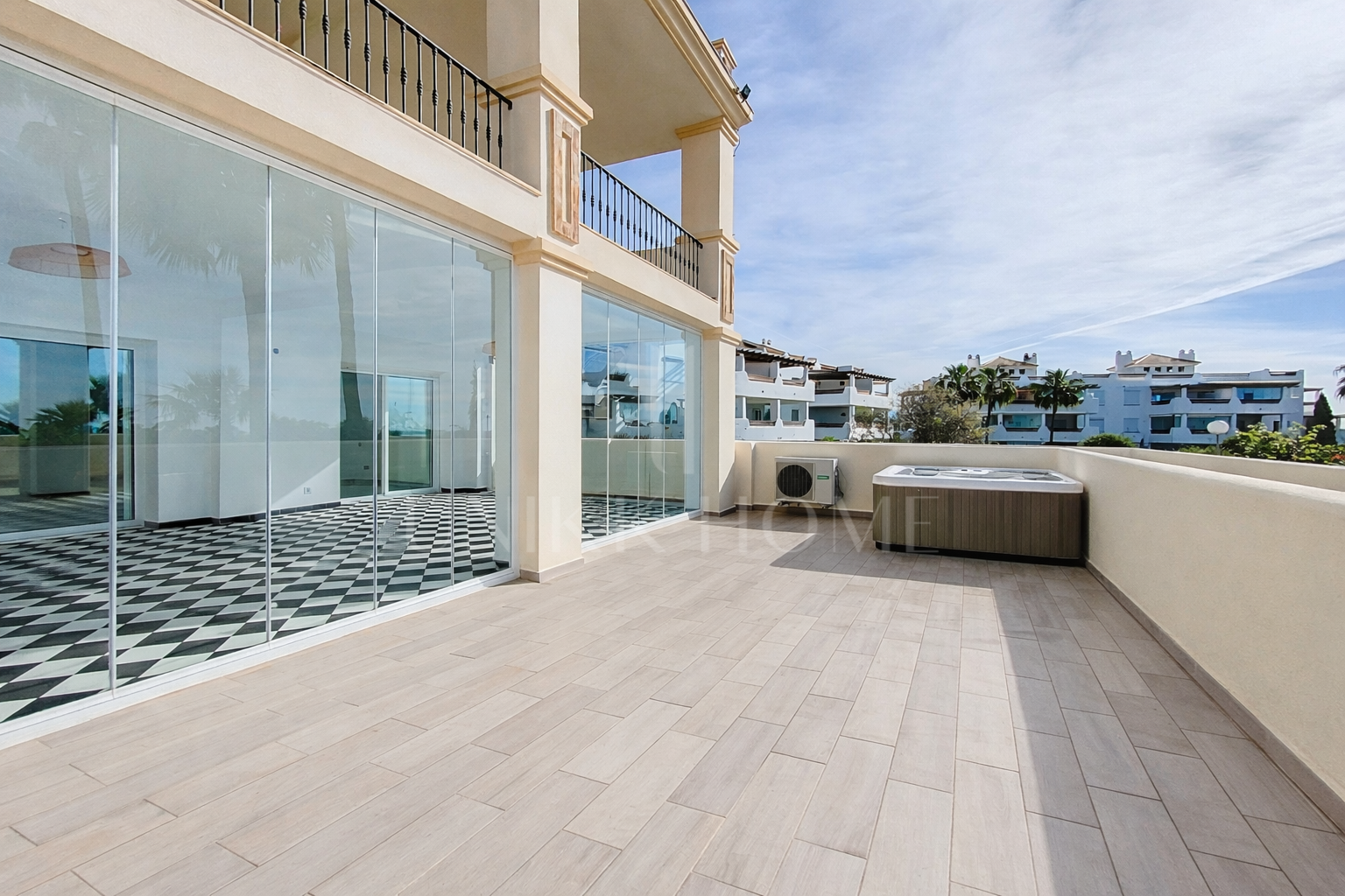 Elevated Ground Floor Sea View Apartment for Sale in Estepona East – Large Terraces & Jacuzzi