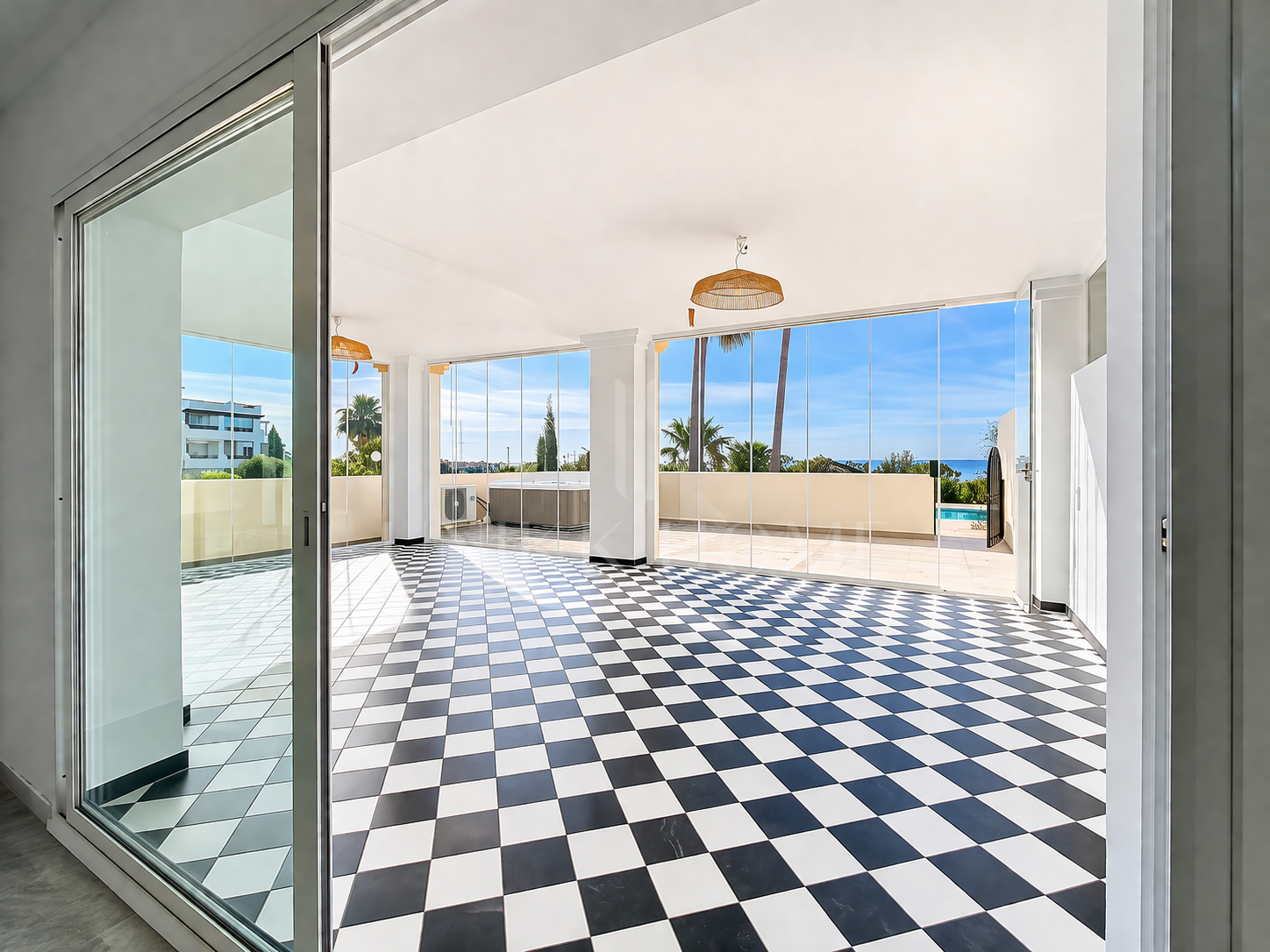 Elevated Ground Floor Sea View Apartment for Sale in Estepona East – Large Terraces & Jacuzzi