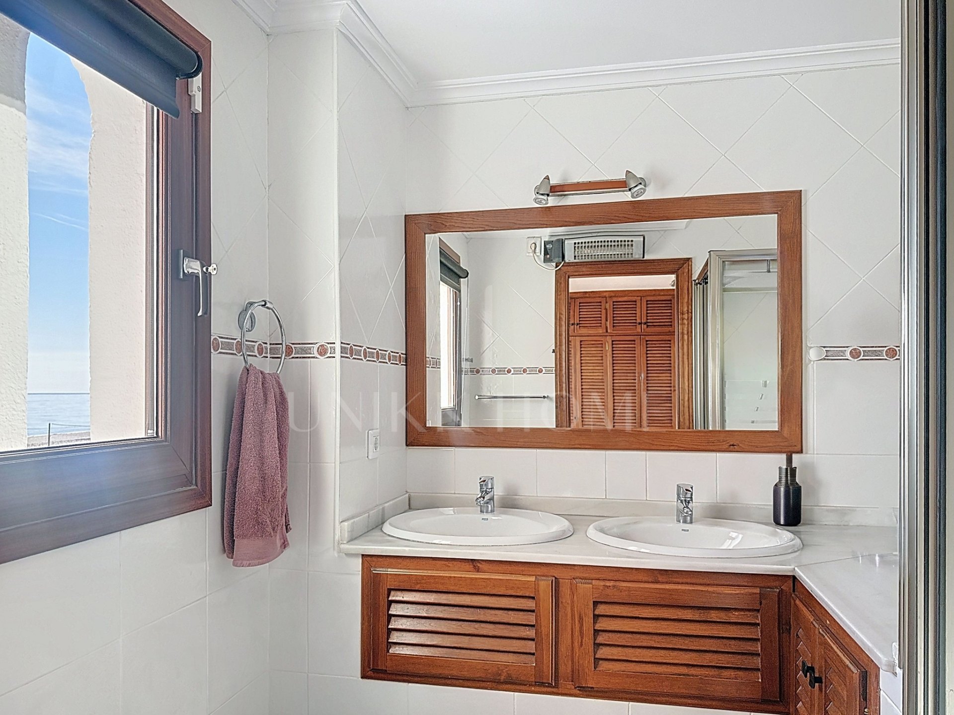 Corner townhouse on the beachfront in Marina de Casares, Casares Playa