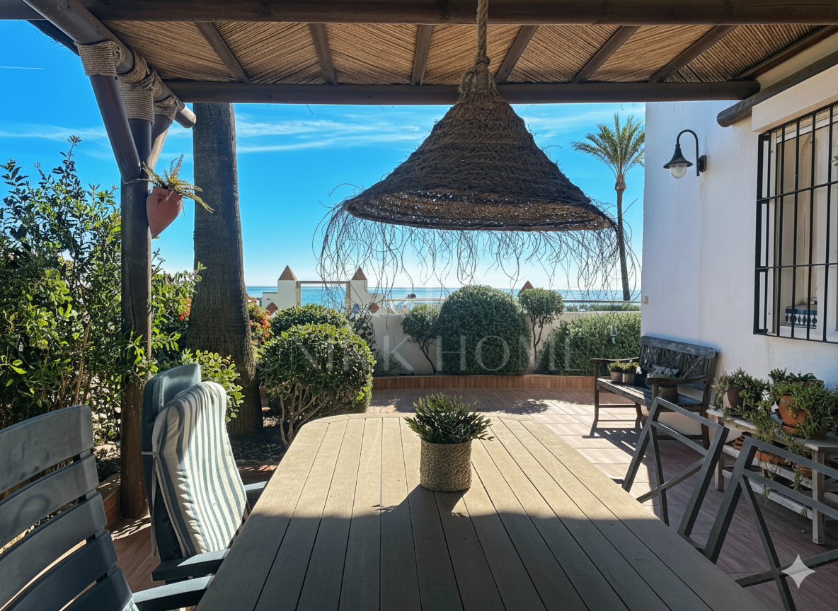 Corner townhouse on the beachfront in Marina de Casares, Casares Playa