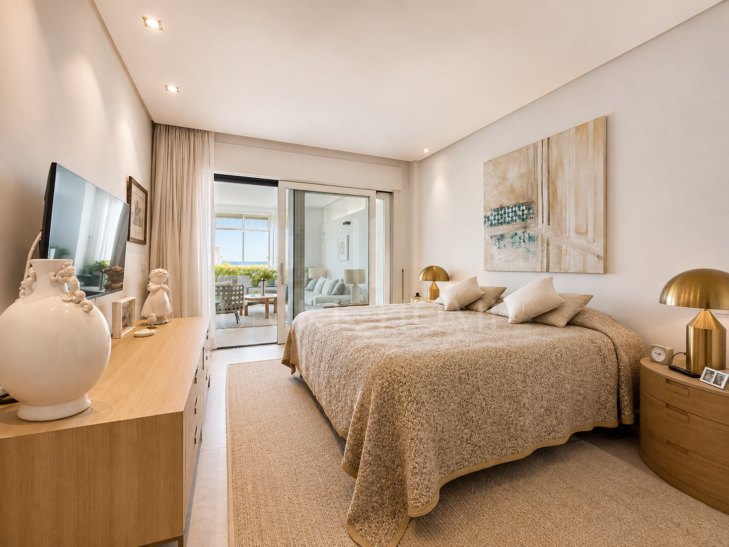 Seafront Luxury Apartment with Timeless Elegance in Estepona’s Doncella Beach