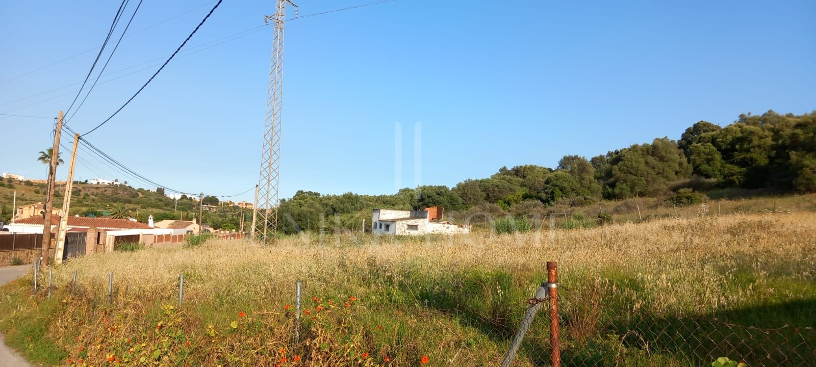 Terreno con casa para reformar