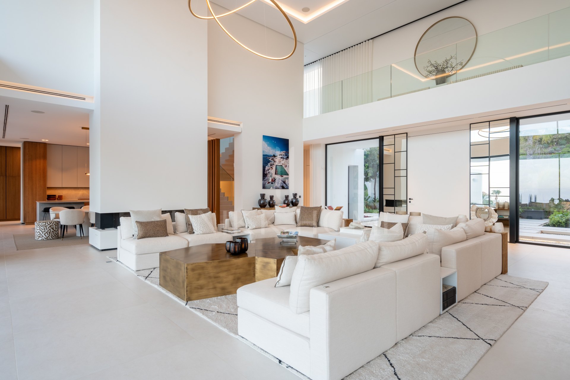 Casa De Canto is an exceptional seven-bedroom contemporary estate, in prestigious gated community of El Madroñal.