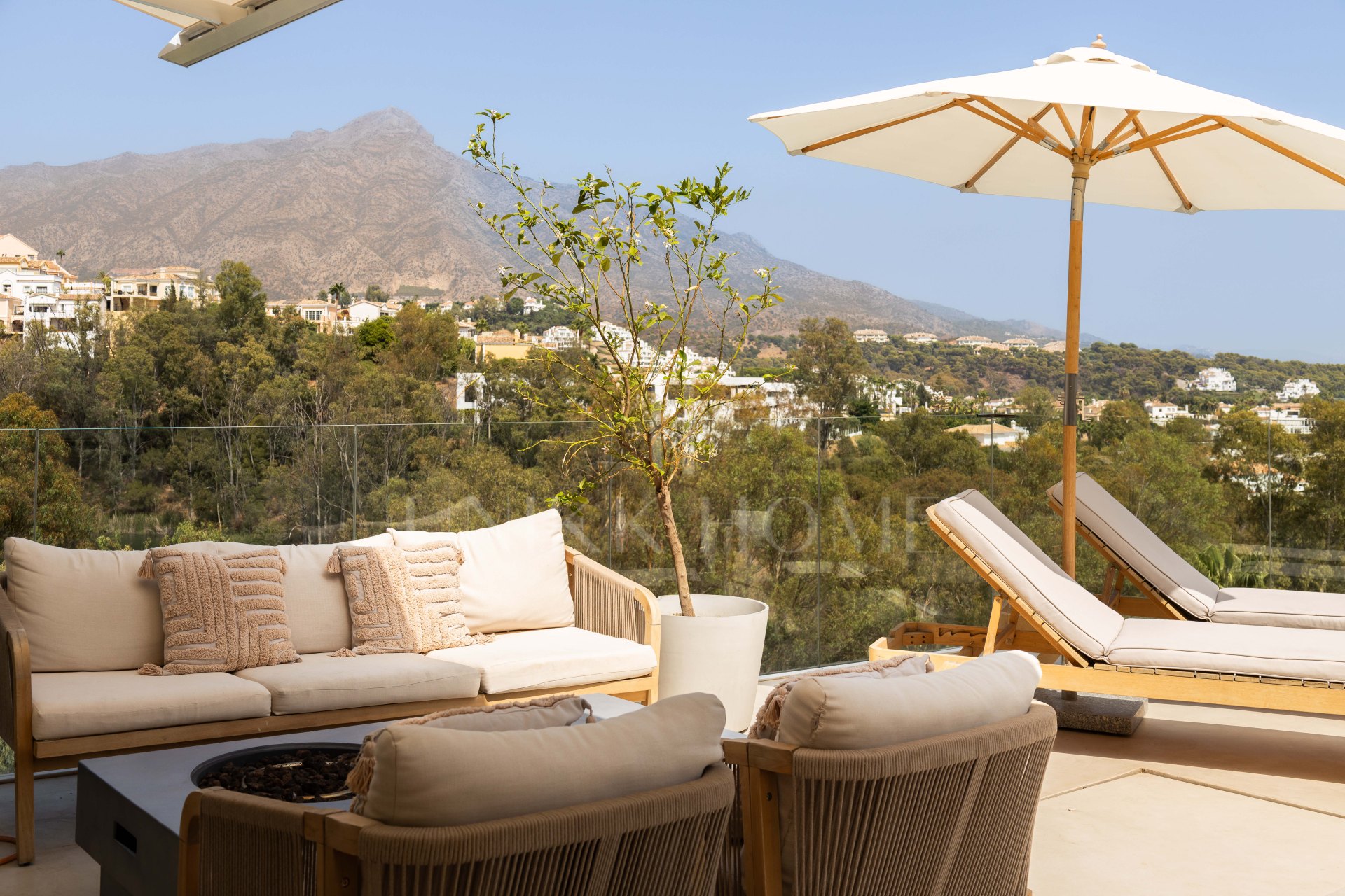 Panoramic sea, lake and La Concha views meet modern design, a private plunge pool and stylish outdoor living in Les Belvederes, Nueva Andalucia.