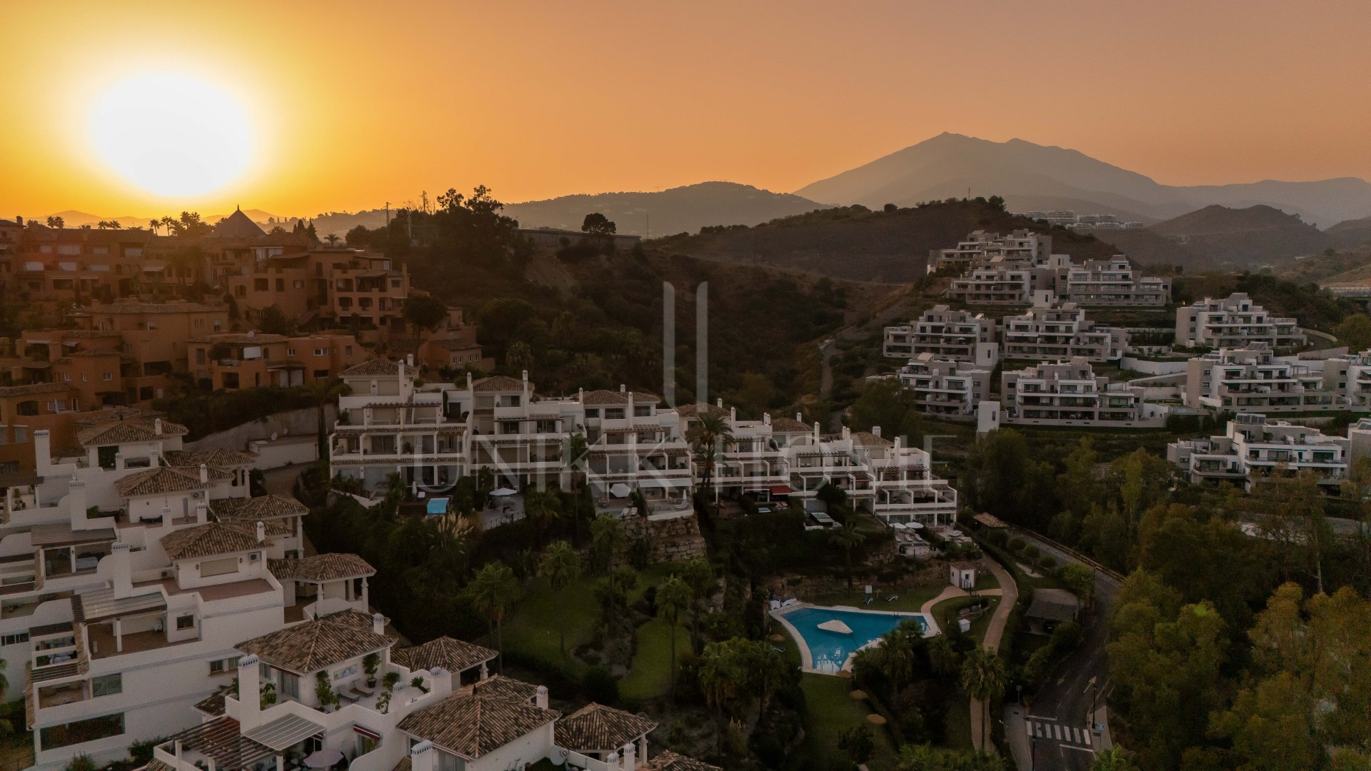 Panoramic sea, lake and La Concha views meet modern design, a private plunge pool and stylish outdoor living in Les Belvederes, Nueva Andalucia.
