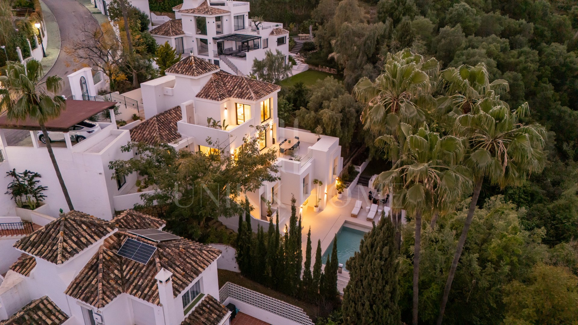Welcome to Villa Lucalle, a contemporary masterpiece located in the picturesque grounds of Los Naranjos Hill Club in La Cerquilla, Nueva Andalucía.