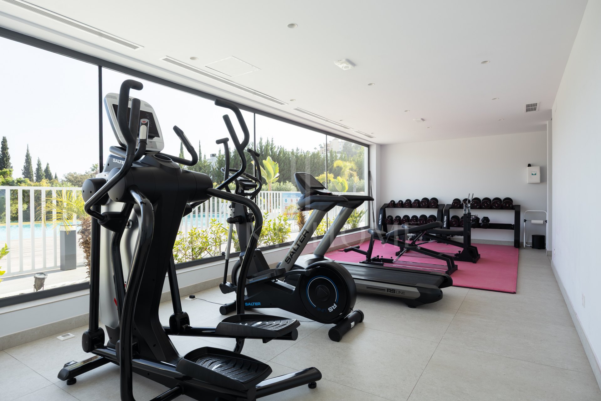 Elegant 2-bed, 2-bath apartment in Marbella’s Golf Valley with 112m² interior, 43m² terrace, luxury finishes, pools, gym, concierge & 2 parking spaces.