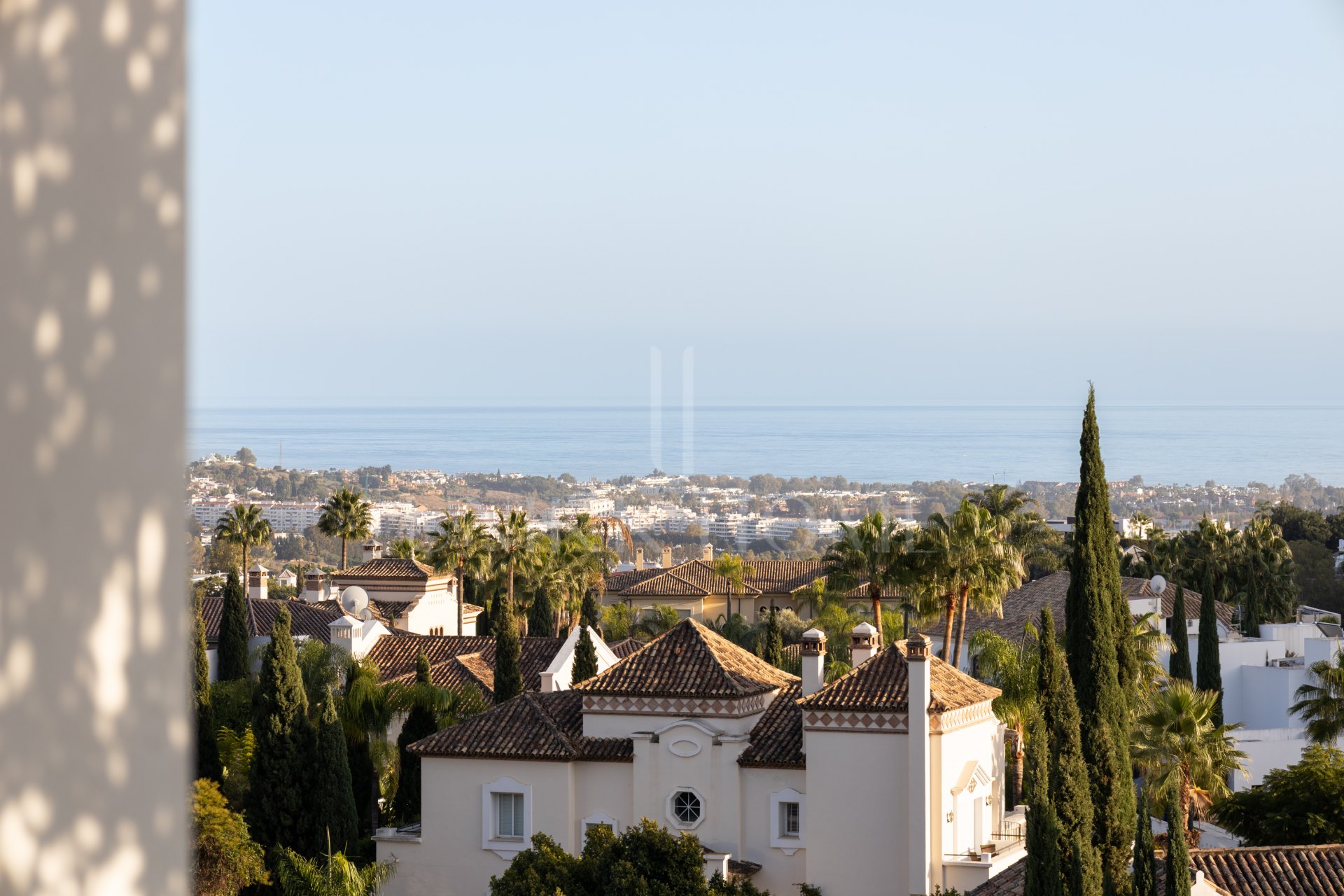 Elegant 2-bed, 2-bath apartment in Marbella’s Golf Valley with 112m² interior, 43m² terrace, luxury finishes, pools, gym, concierge & 2 parking spaces.