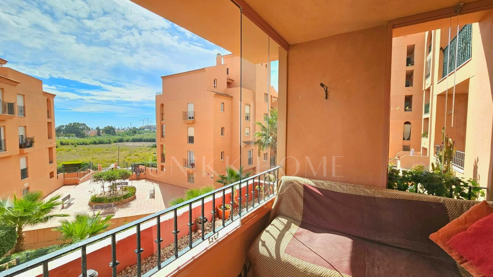 South-facing two-bedroom apartment with pool at Los Hidalgos Golf, Manilva.