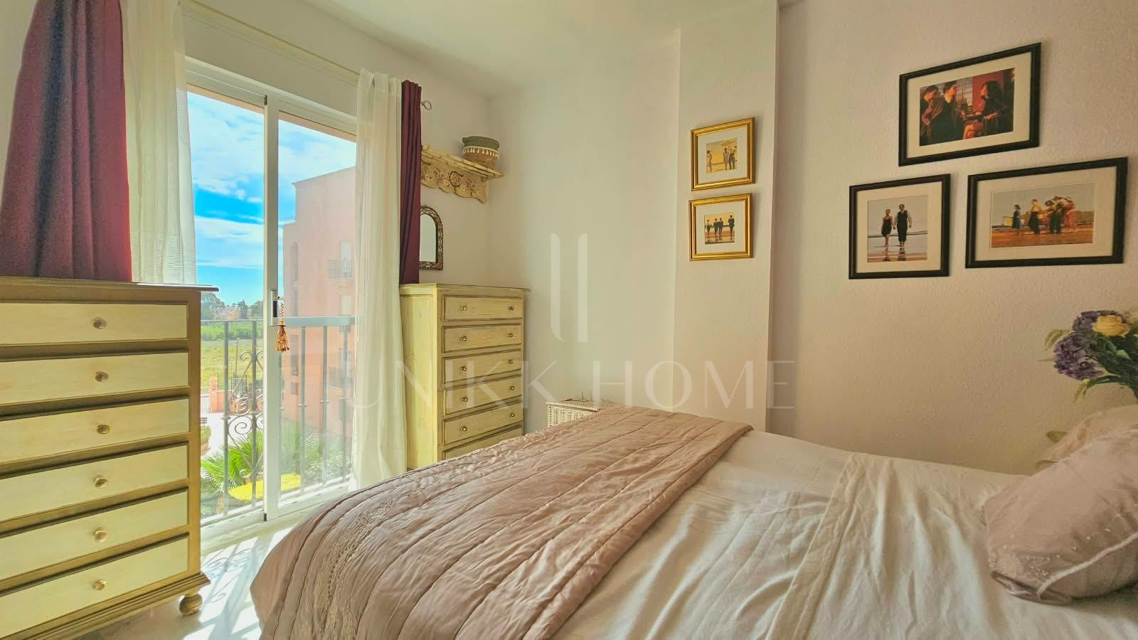 South-facing two-bedroom apartment with pool at Los Hidalgos Golf, Manilva.