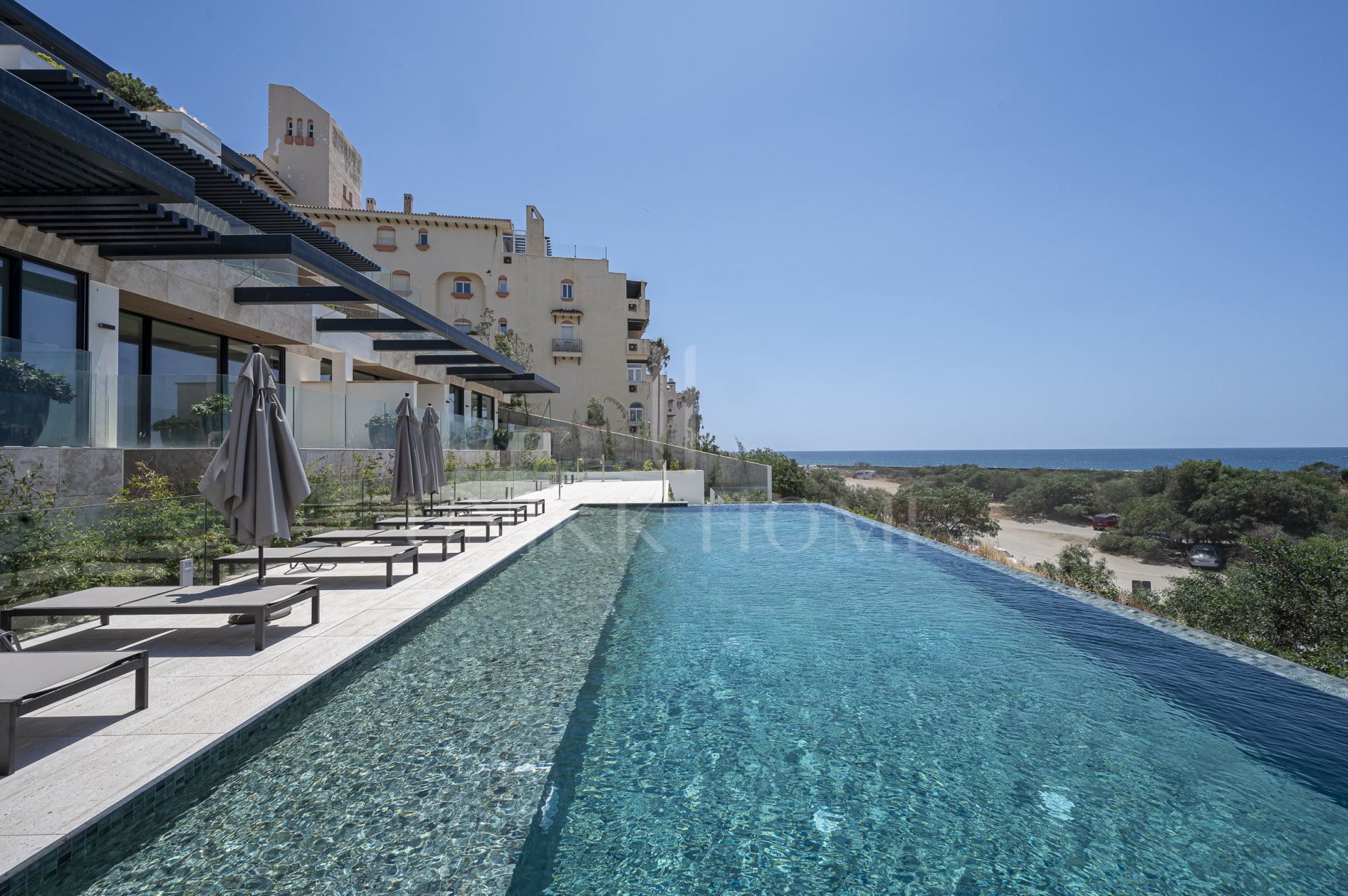 Luxury Beachfront Apartment with Panoramic Sea Views in Estepona