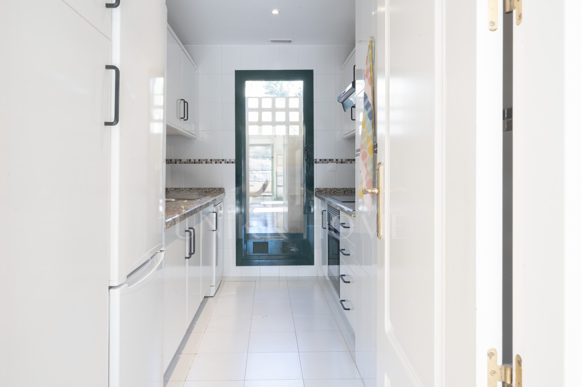 A furnished southwest-facing duplex penthouse in Torrequebrada with panoramic sea and golf views, expansive terraces and two garage parking spaces.