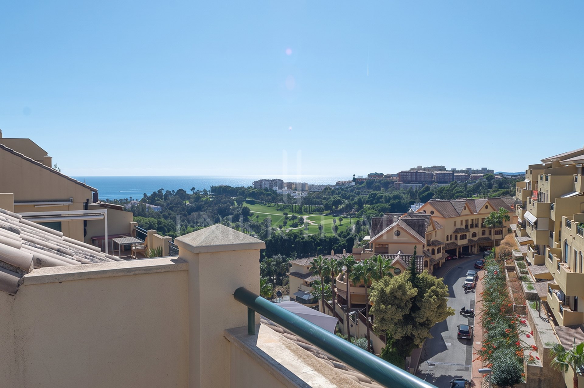 A furnished southwest-facing duplex penthouse in Torrequebrada with panoramic sea and golf views, expansive terraces and two garage parking spaces.