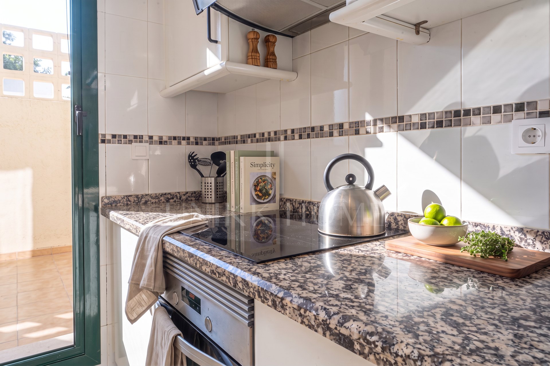 A furnished southwest-facing duplex penthouse in Torrequebrada with panoramic sea and golf views, expansive terraces and two garage parking spaces.