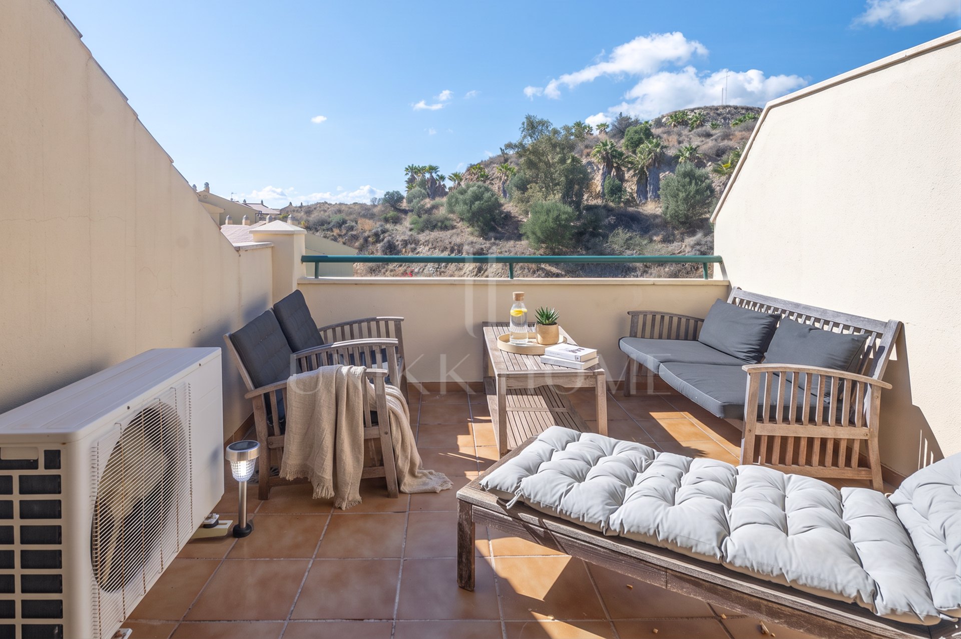A furnished southwest-facing duplex penthouse in Torrequebrada with panoramic sea and golf views, expansive terraces and two garage parking spaces.