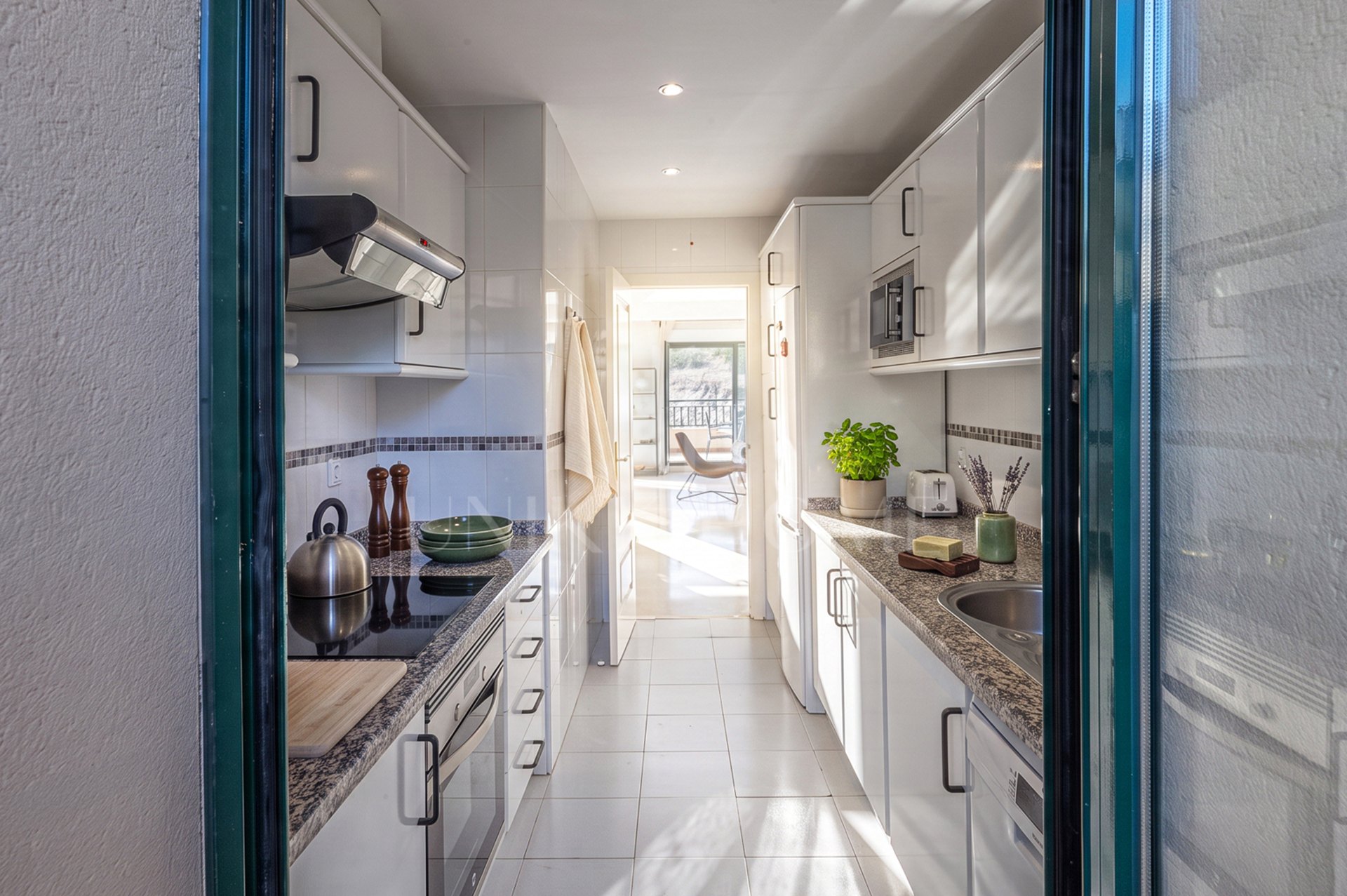 A furnished southwest-facing duplex penthouse in Torrequebrada with panoramic sea and golf views, expansive terraces and two garage parking spaces.