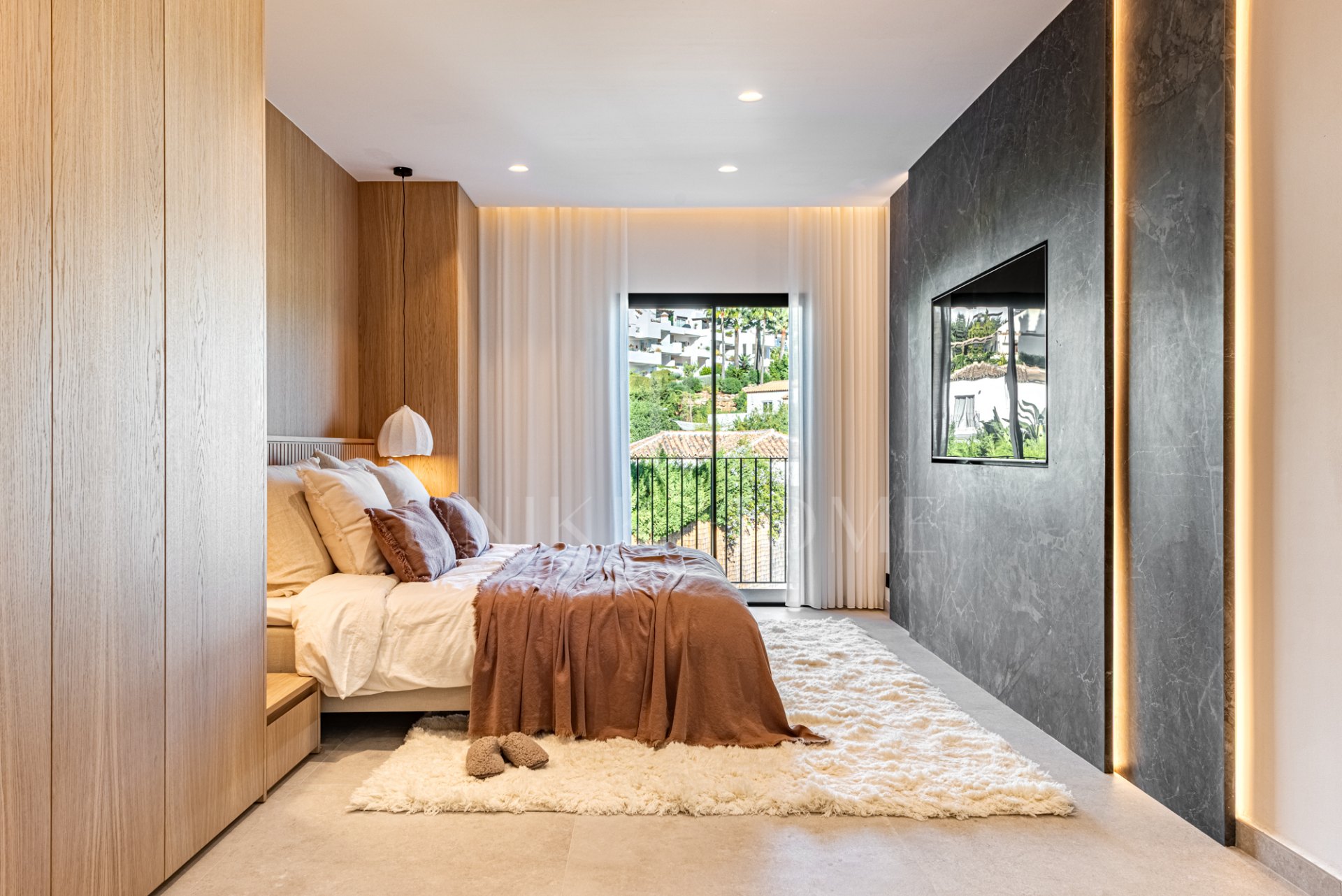 Top-renovated villa hidden inside a gated community in Nueva Andalucía.